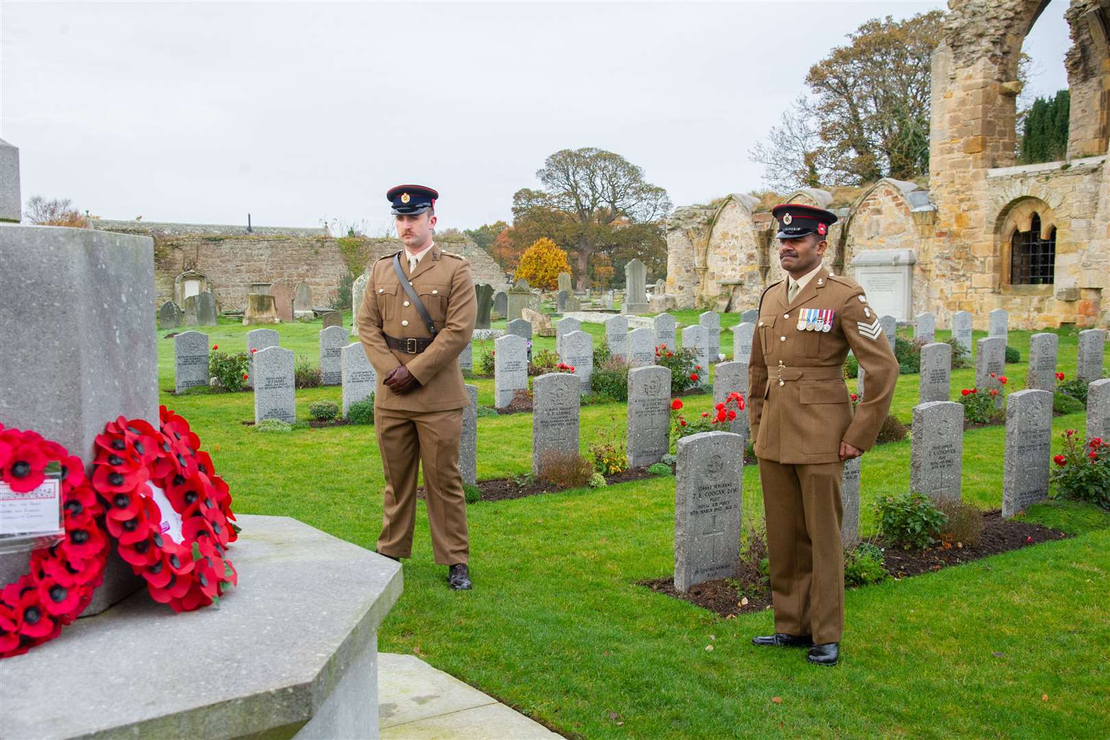 Lt Lalley and Sgt Yaravoli, of the 39 Engineer Regiment, lay a wreath at the Kinloss Memorial, in the grounds of the abbey, on Remembrance Sunday 2020. Picture: Daniel Forsyth.