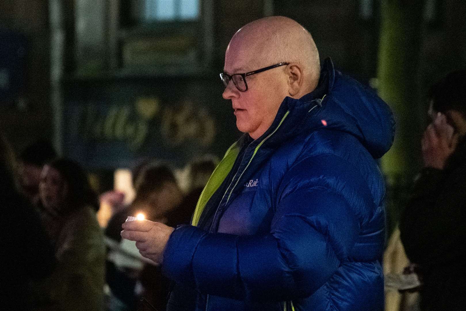 Laying a candle in memory of Keith. Picture: Daniel Forsyth