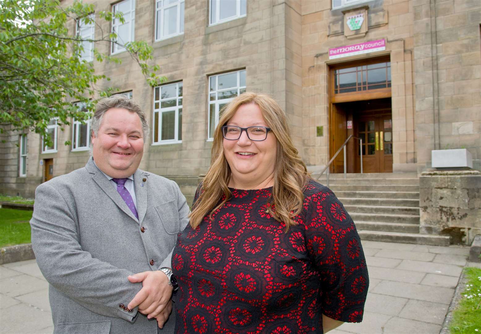 Sharing a moment with then group co-leader Graham Leadbitter. Picture: Daniel Forsyth