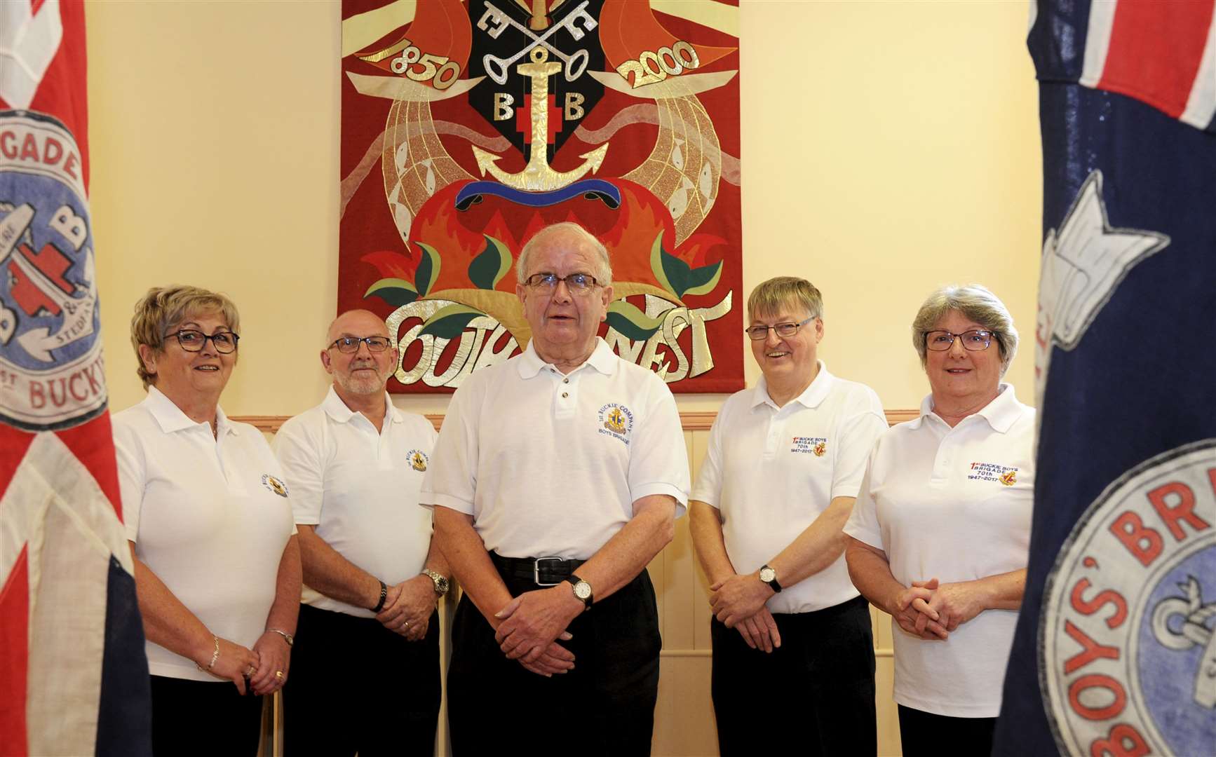 Celebrating 265 years of service to Buckie Boys' Brigade are (from left) Catherine Stewart, Grant Stewart, Gordon Pirie, Captain Alan McIntosh and Jenny McIntosh. Picture: Eric Cormack