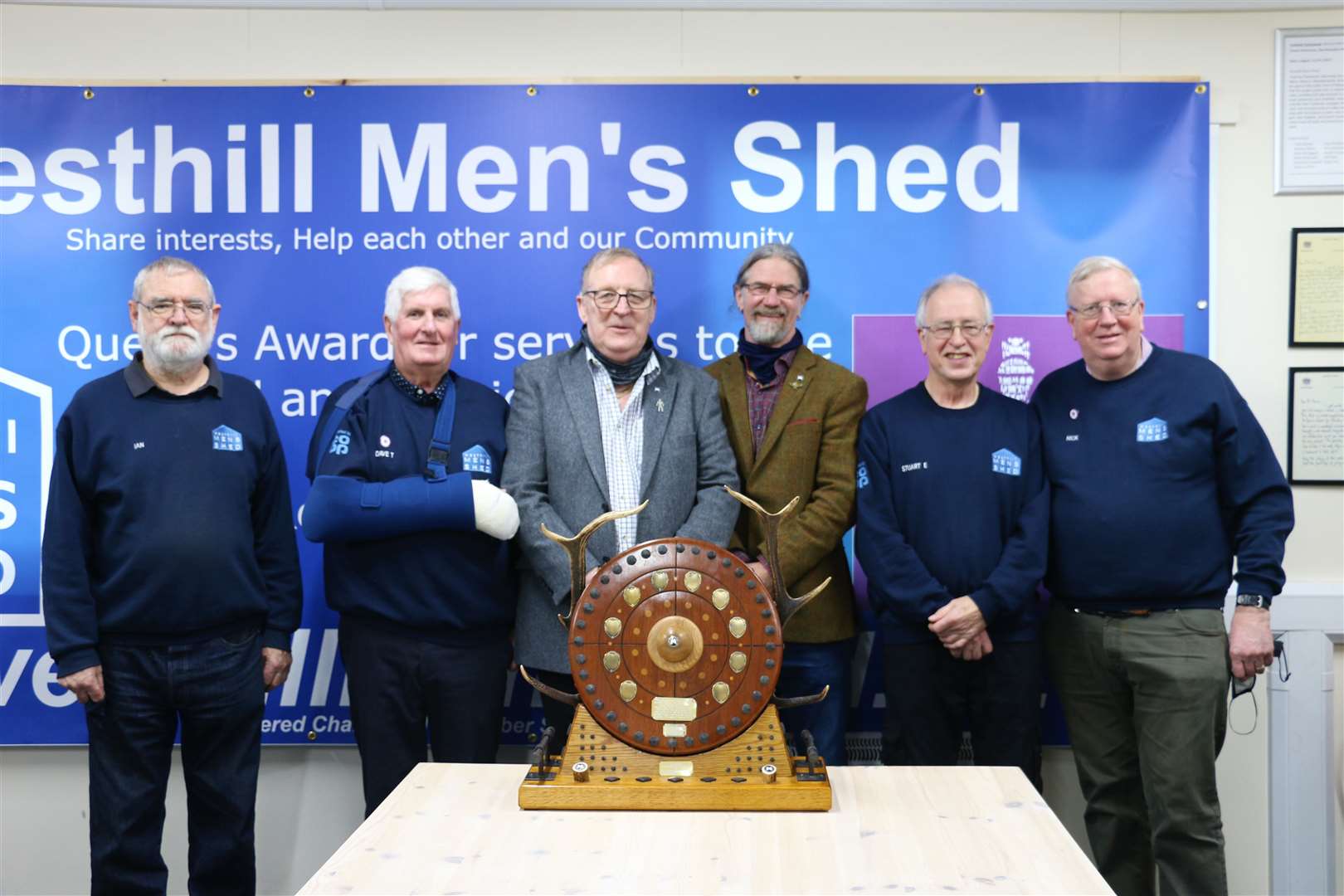 The trophy was presented to Westhill and District Men's Shed.