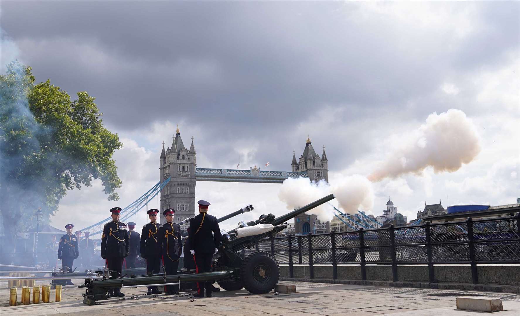 Members of the Honourable Artillery Company fire a gun salute at the Tower of London to mark the death of the Queen (James Manning/PA)