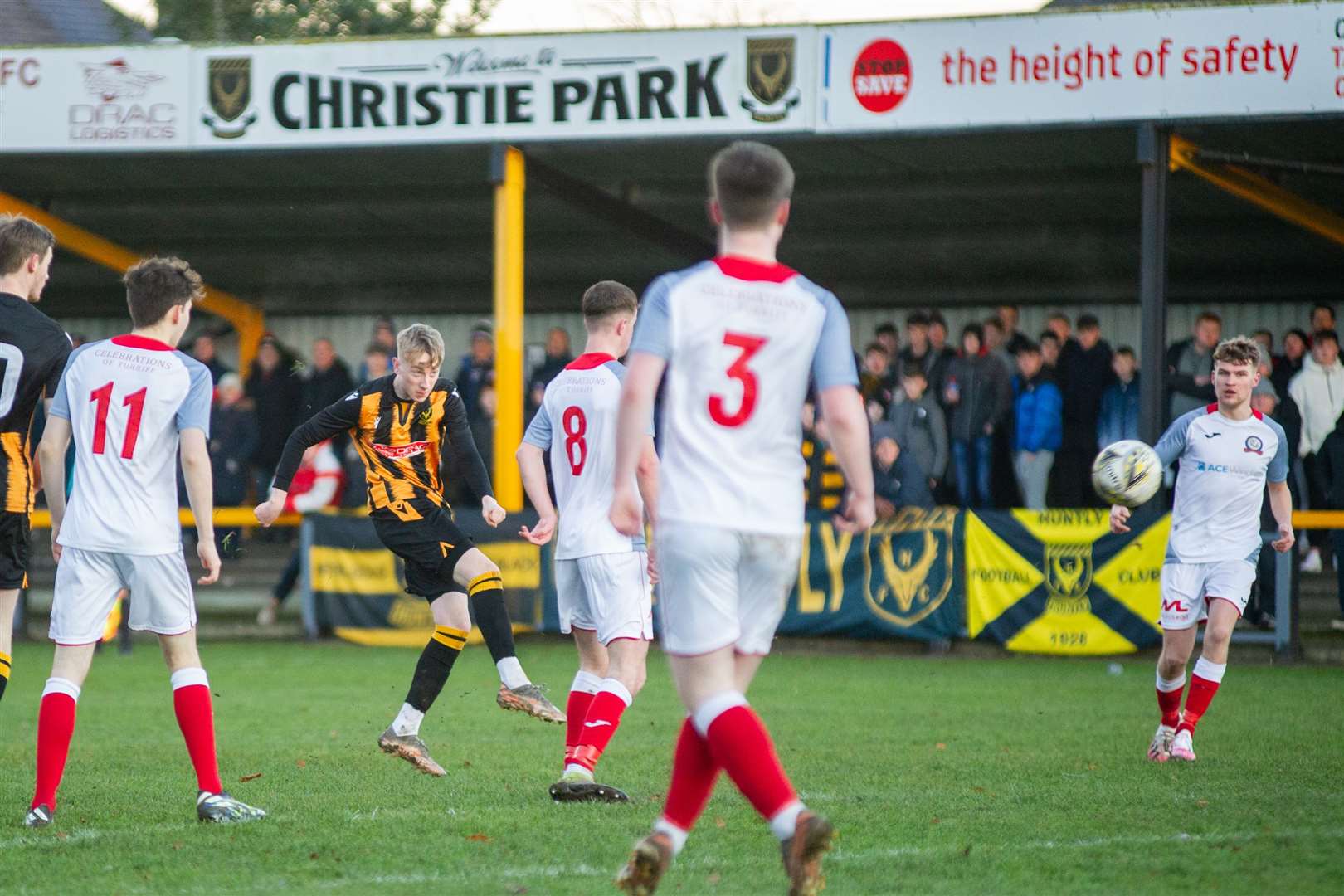 On-loan Aberdeen youngster Jack MacIver (left) has an effort on goal for Huntly in the opening period. Picture: Daniel Forsyth..