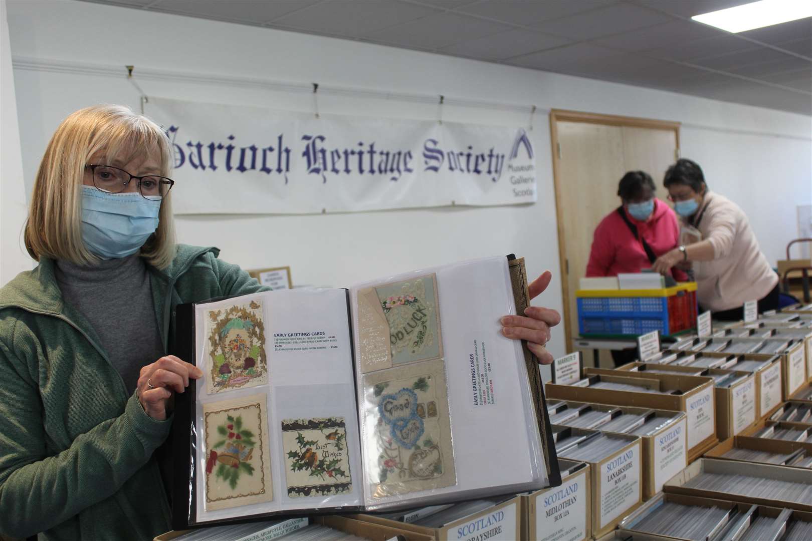 Local collector Frances Watt with some of her silk embroidered postcards at Saturday's Grampian Postcard fair at the Garioch Heritage centre. Picture: Griselda McGregor.