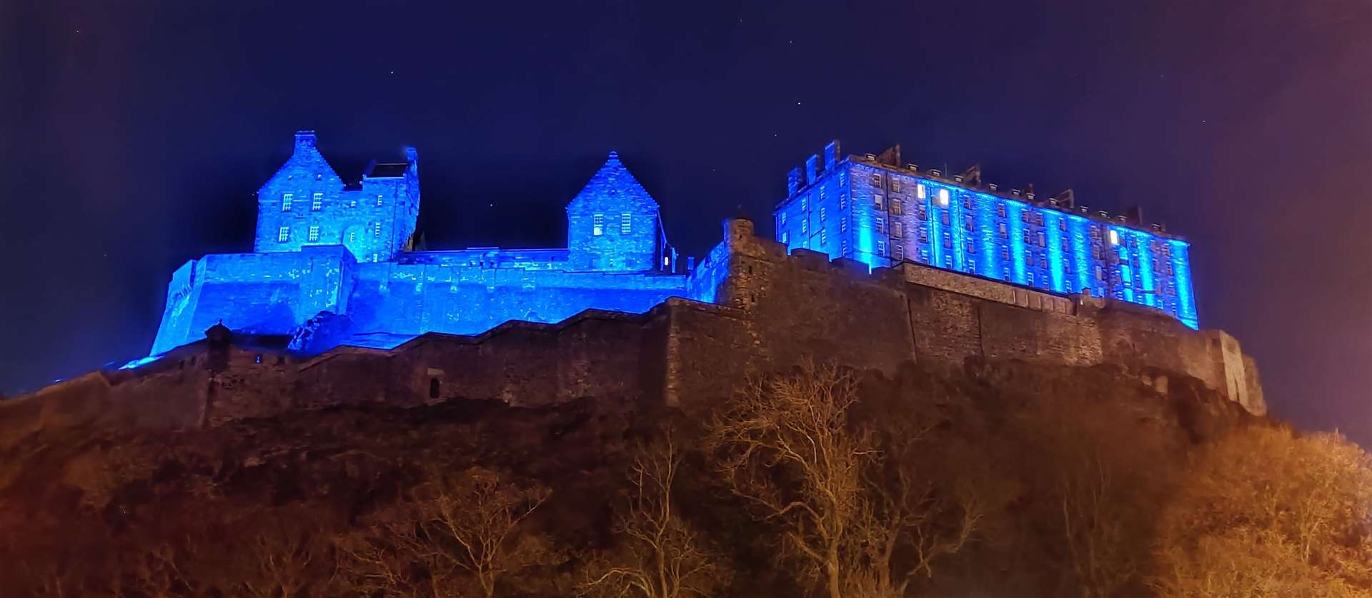 Edinburgh Castle lights up for Parkinson's in 2021.