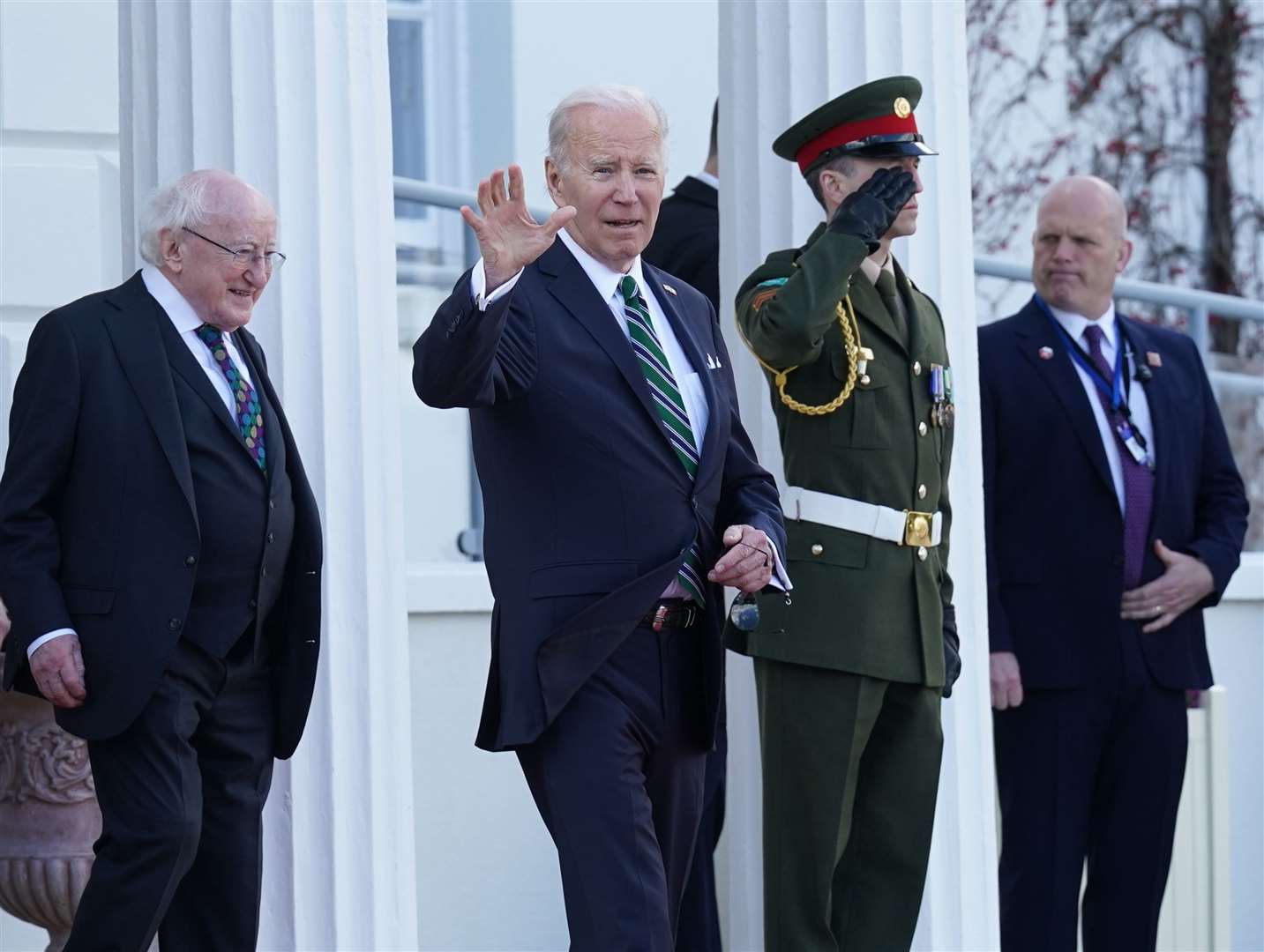 Joe Biden gives a wave as he departs Aras an Uachtarain (Brian Lawless/PA)