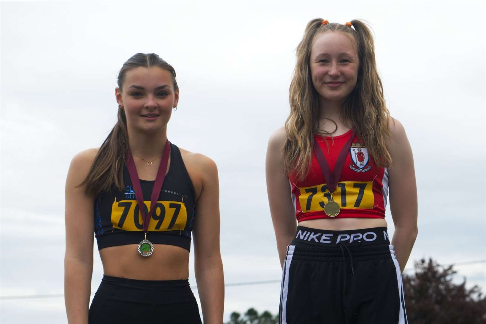 Lexi Grant (left) and Anna Reid were closely matched in both the long jump and triple jump. Picture: Kyle Wilkinson