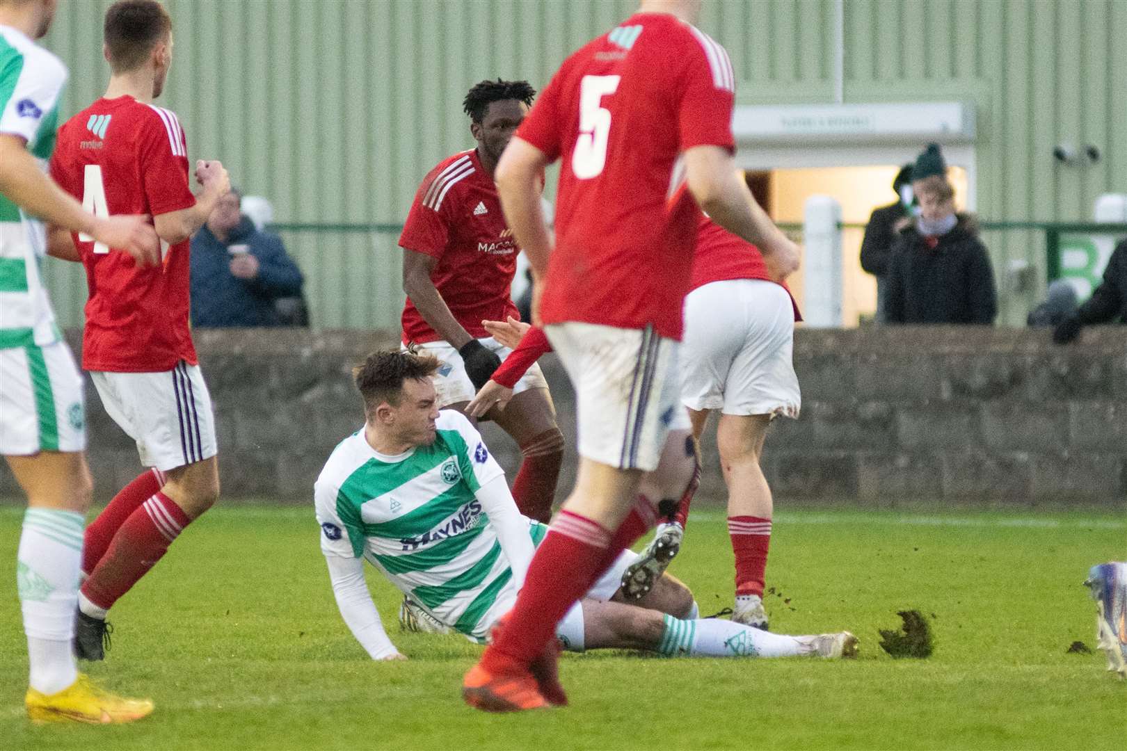 Buckie centre back Jack Murray is sent off for this challenge...Buckie Thistle FC (3) vs Deveronvale FC (2) - Highland Football League 22/23 - Victoria Park, Buckie 03/01/2023...Picture: Daniel Forsyth..