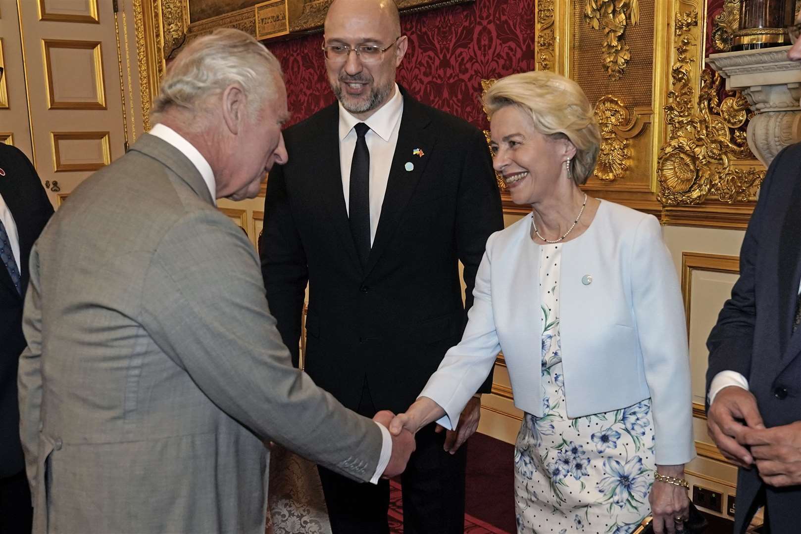 Charles greets Ursula von der Leyen at the palace reception (Aaron Chown/PA)