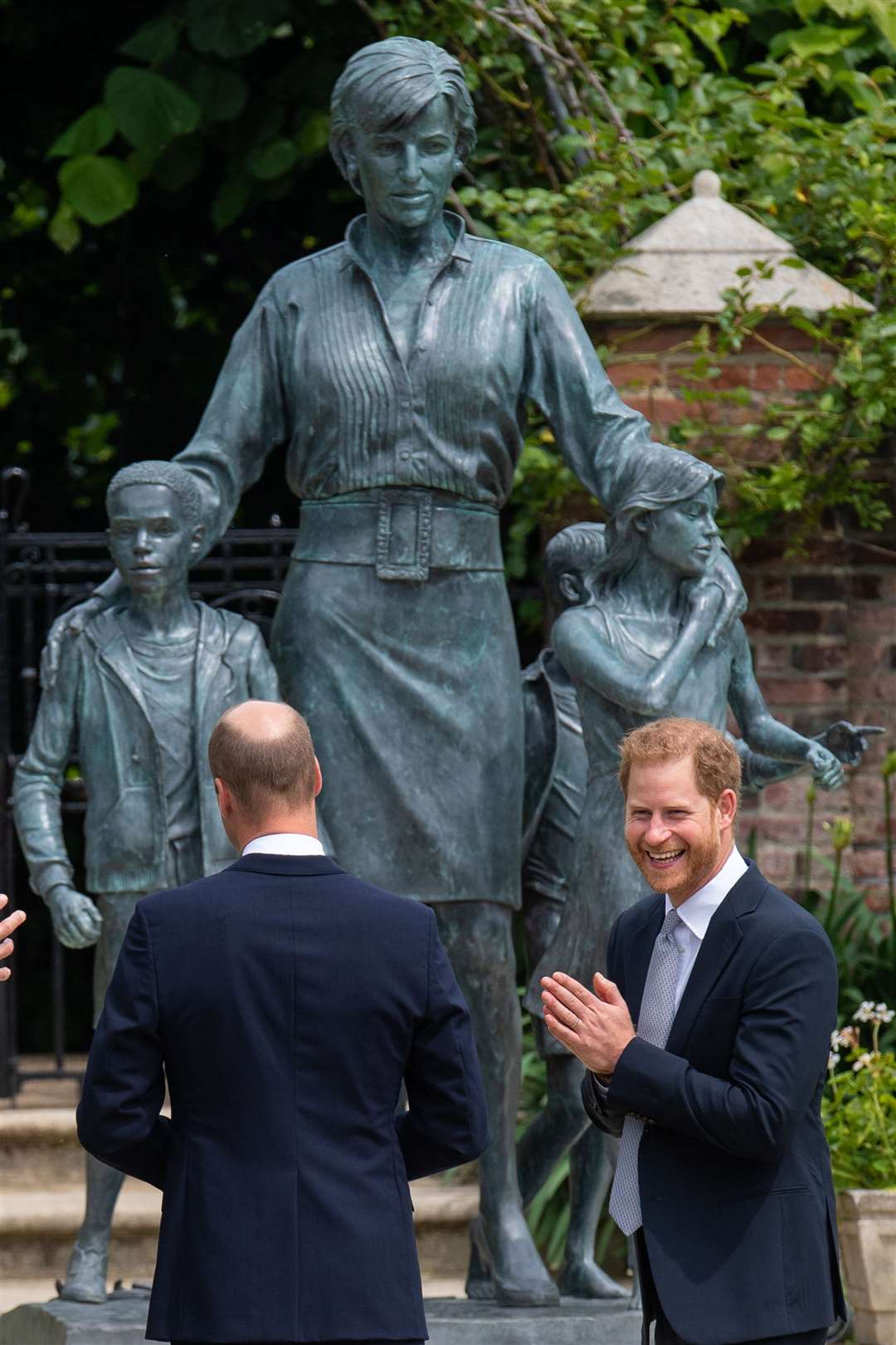 William and Harry with the statue (Dominic Lipinski/PA)