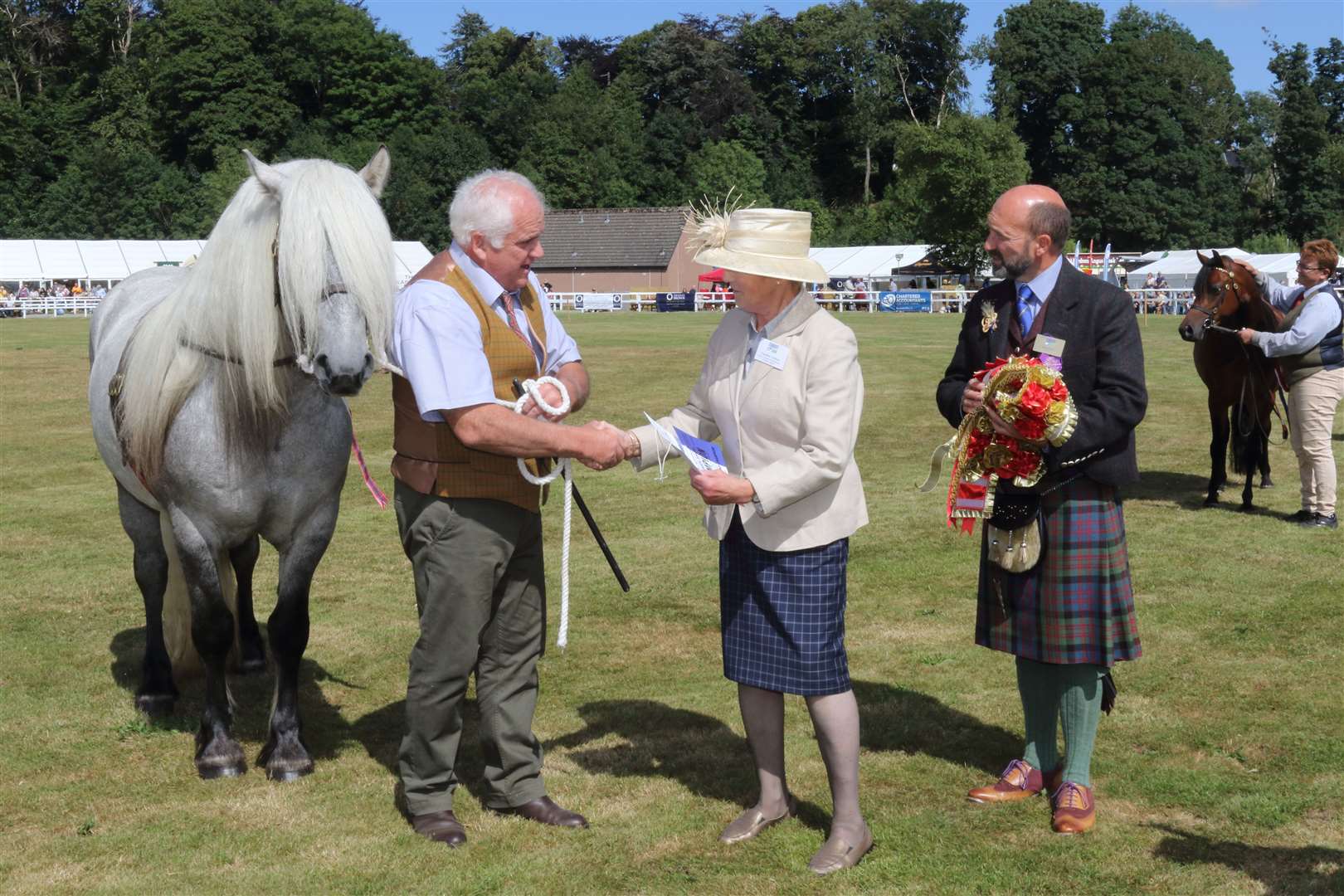 In hand champion West Lodge McNair with owner Robin Stewart from Durris, judge Caroline Nelson and Show President Alan Gaul. Picture: David Porter