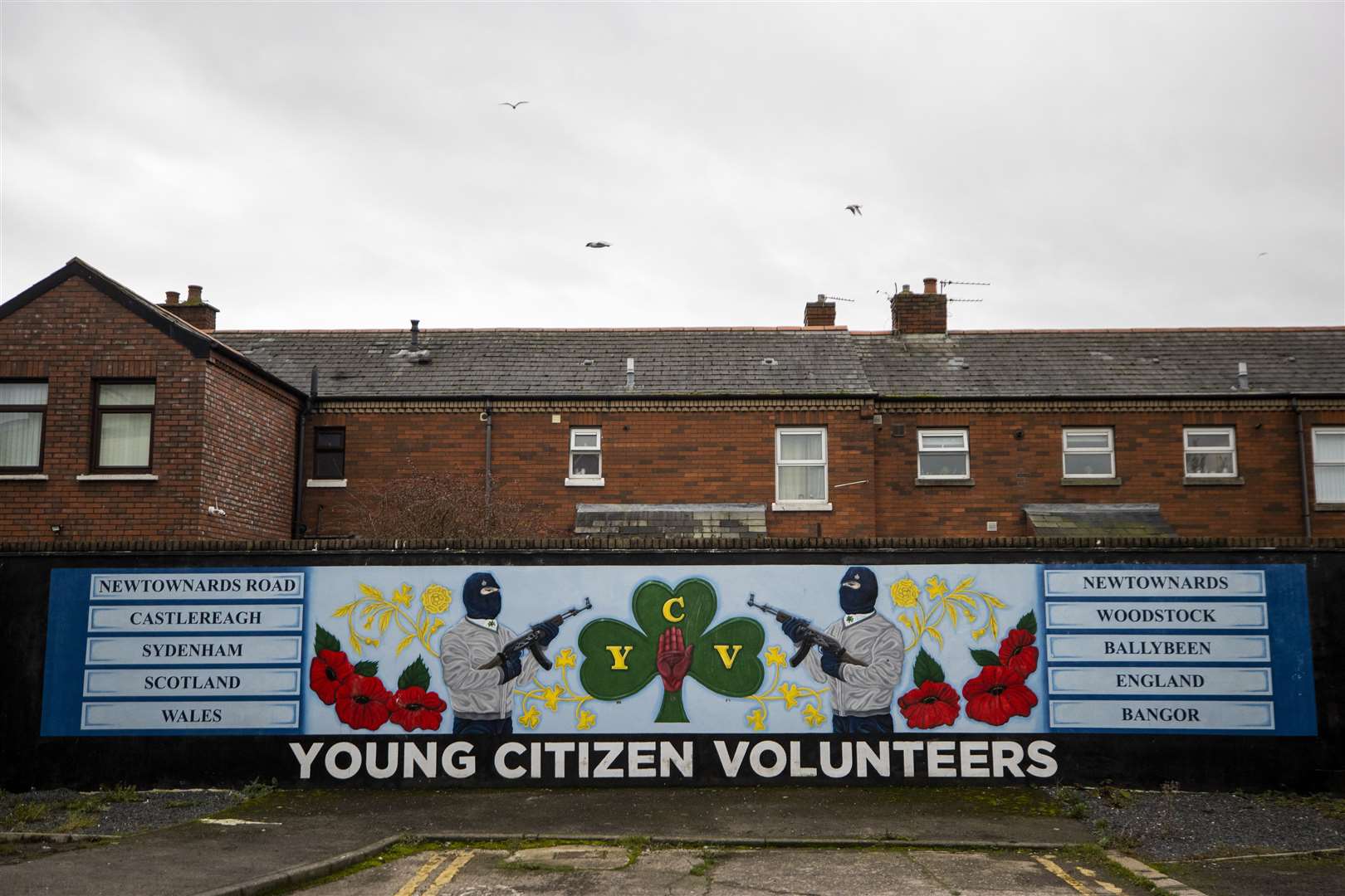 Young Citizen Volunteers (YCV) mural on the wall of a property on the Lower Newtownards Road in east Belfast (PA)