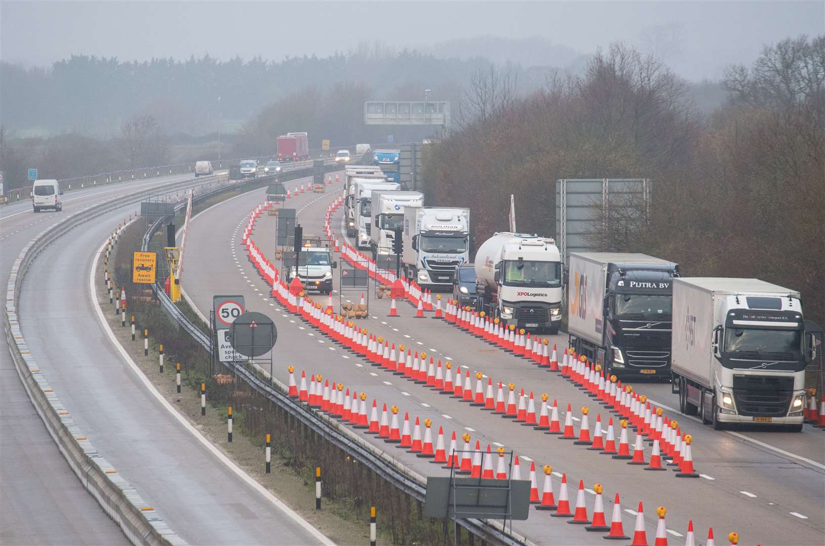 Freight lorries separated from other traffic on a Dover-bound section of the M20 motorway in Kent (Dominic Lipinski/PA)