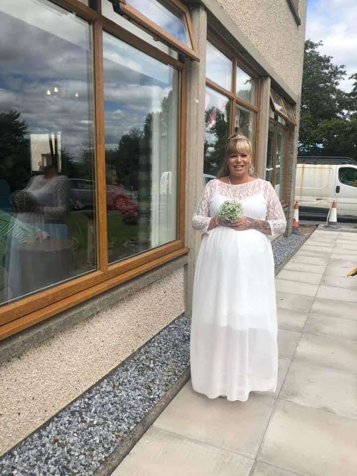Amanda outside Glenisla Care Home in her wedding dress