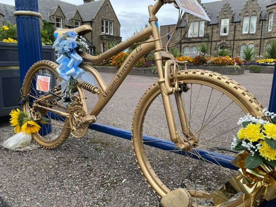 The gold bike in memory of Gemma's daughter in Cluny Square, Buckie.