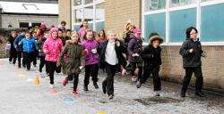 St Thomas Primary School pupils taking part in the Moray Mile.