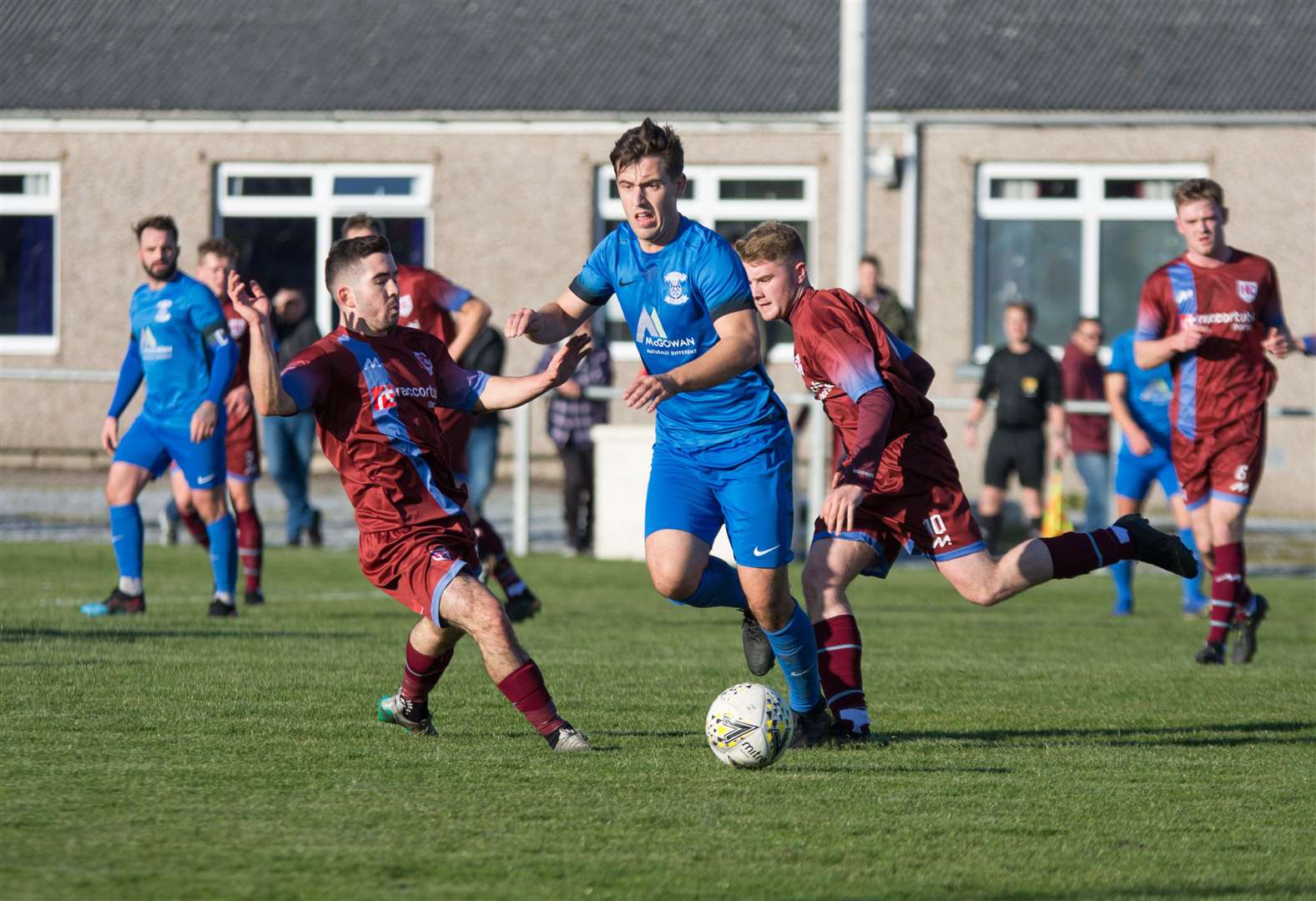 Craig MacAskill tries to stop Strathspey's James McShane. Picture: Becky Saunderson