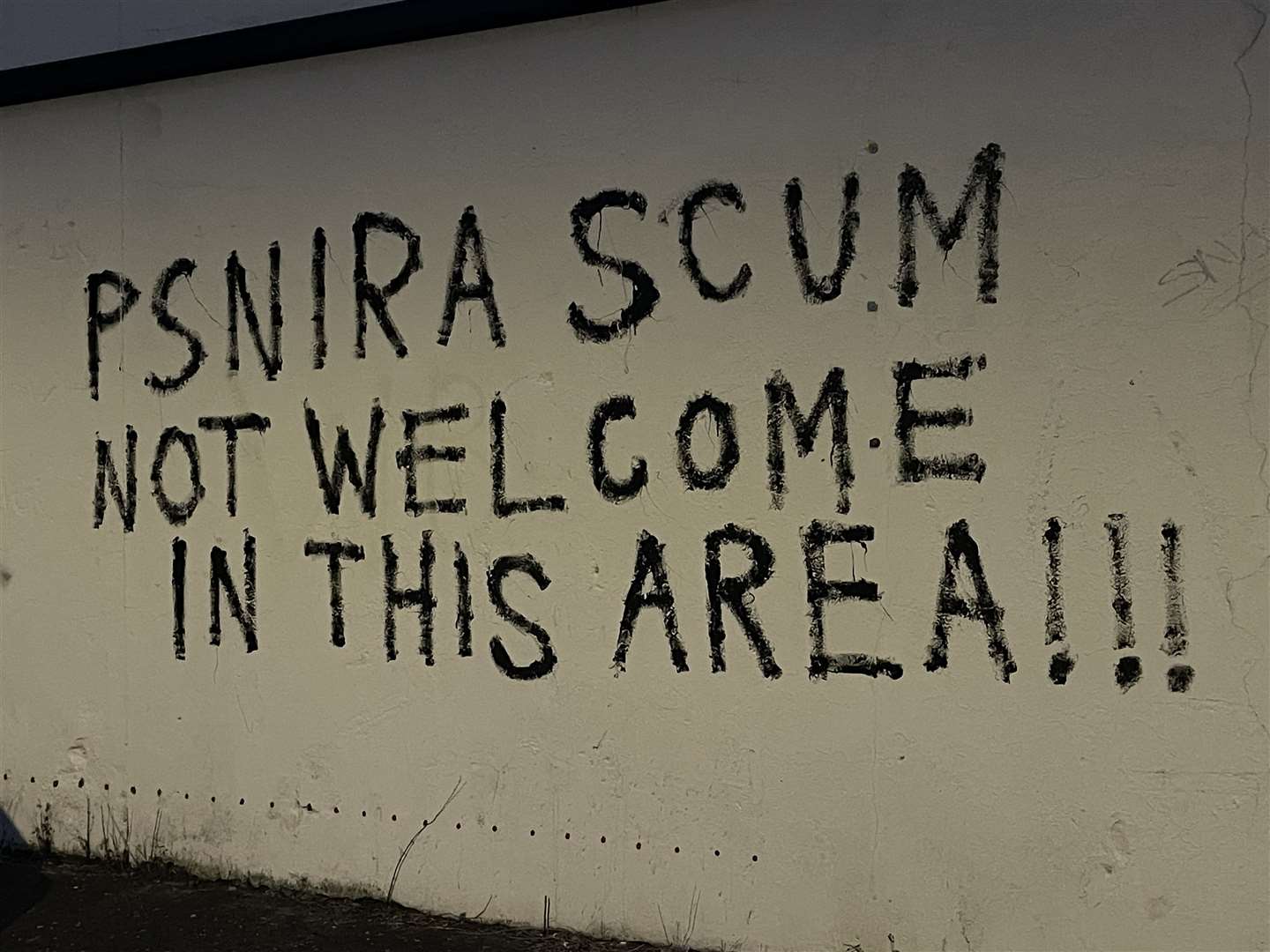 Graffiti on a wall in Eccles Street in Shankill in Belfast (Liam McBurney/PA)