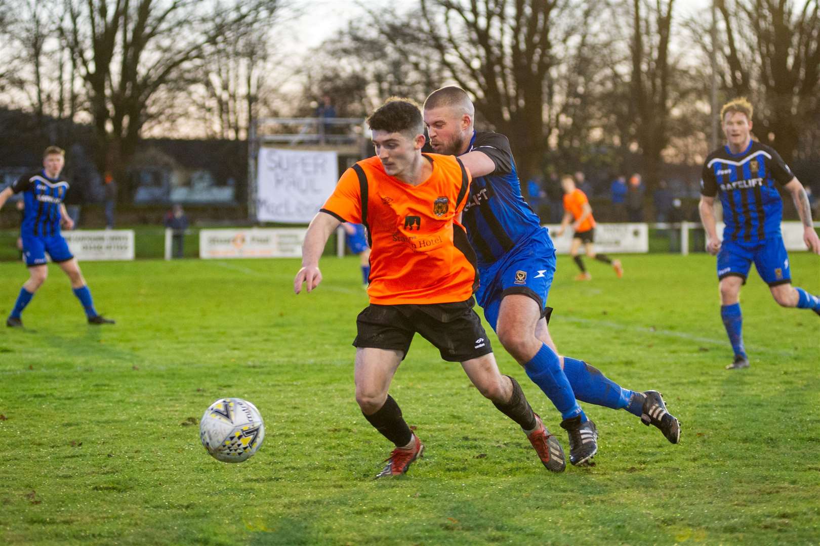 Cammy Bowden (right) in action for Huntly against Rothes last season. Picture: Daniel Forsyth..