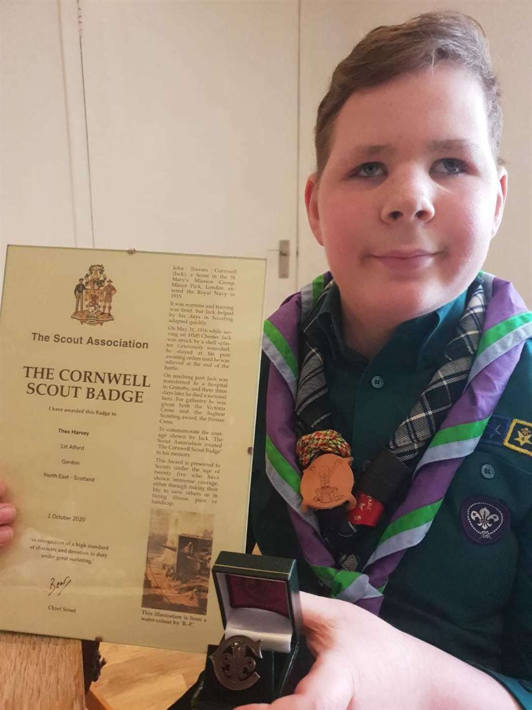 Theo Harvey has been presented with the Cornwell Scout Badge.