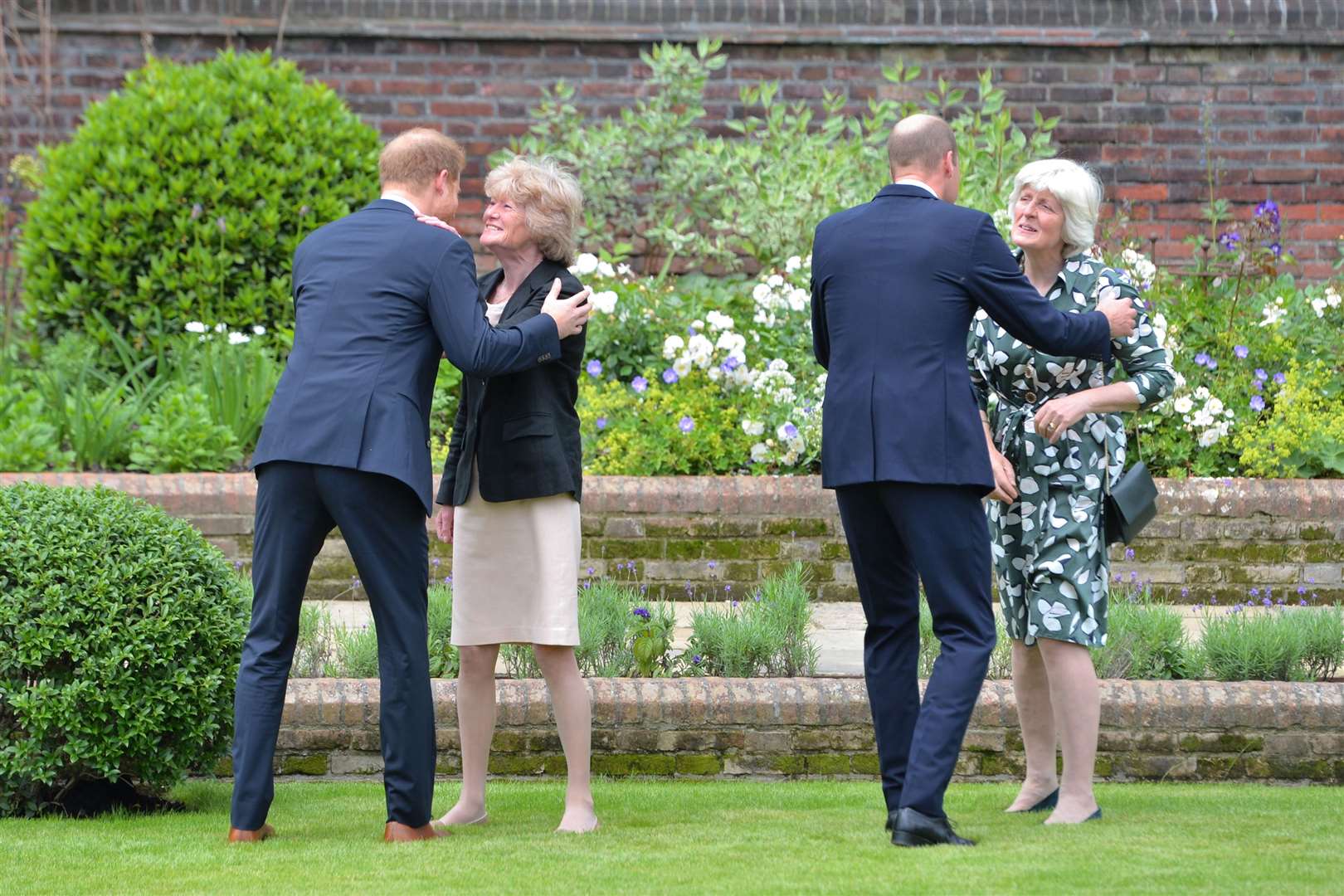 Harry and William greet Lady Sarah McCorquodale and Lady Jane Fellowes (Dominic Lipinski/PA)