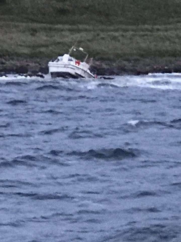 The stricken motor boat lies agroud off burghead. Picture: Buckie RNLI
