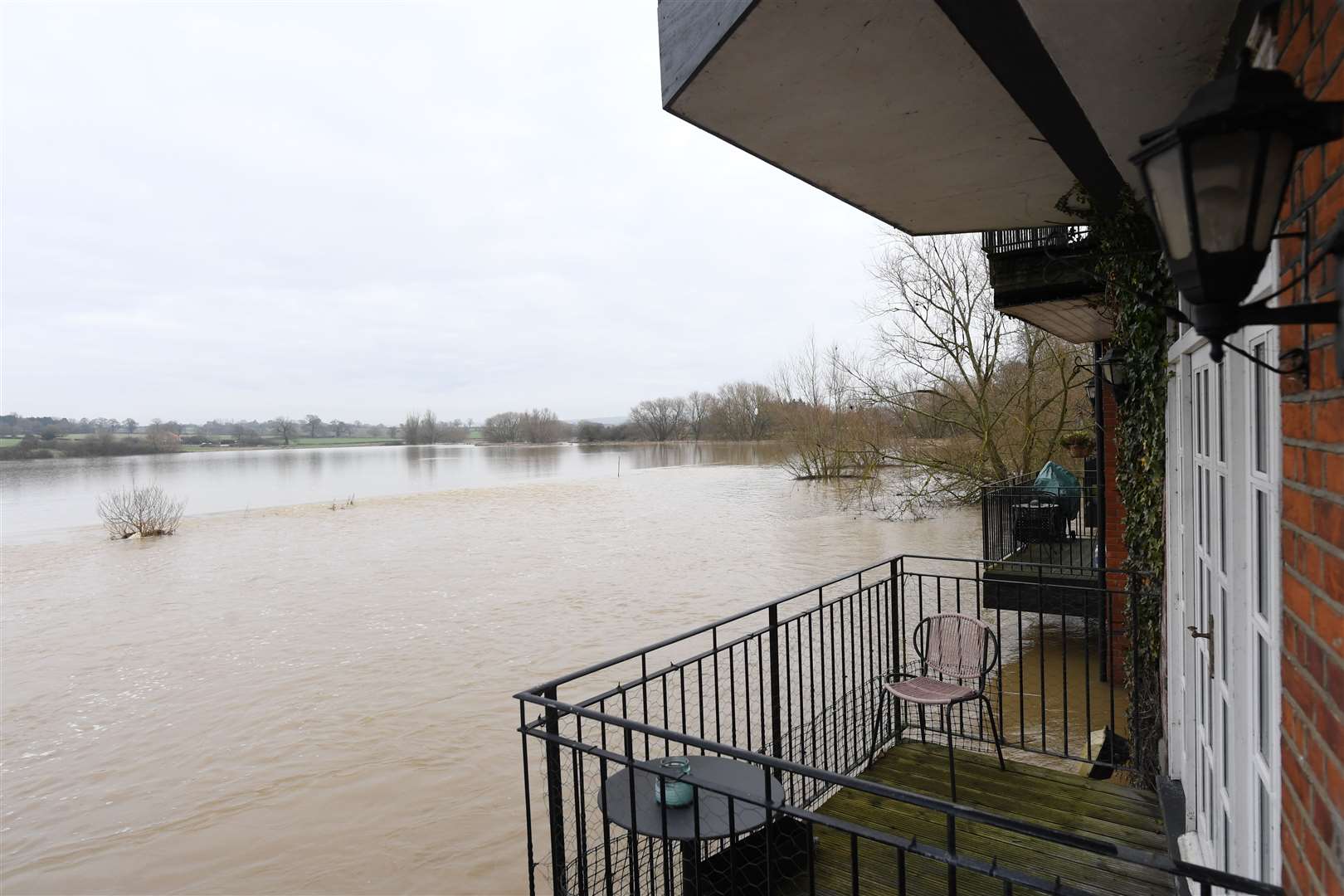 The River Roding after it burst its banks in Abridge, Essex (Stefan Rousseau/PA)