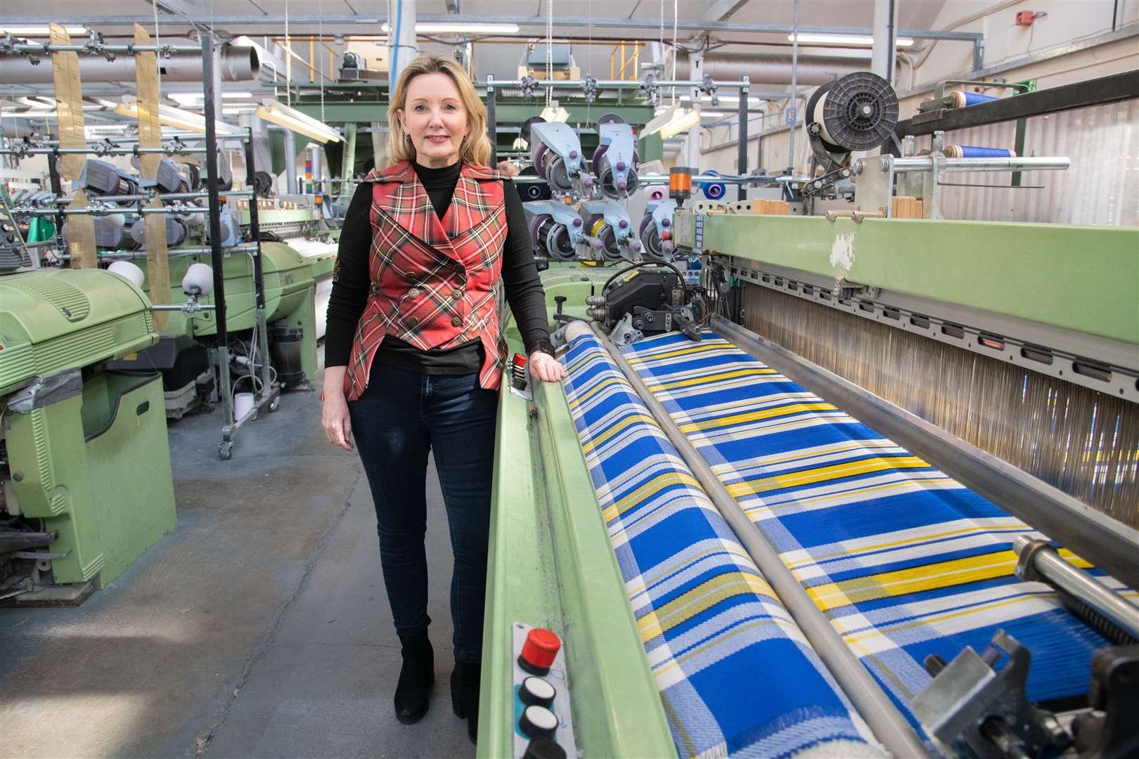 Margo Page McCoy with the Ukrainian Tartan produced by Great Scot in Keith. Picture: Daniel Forsyth