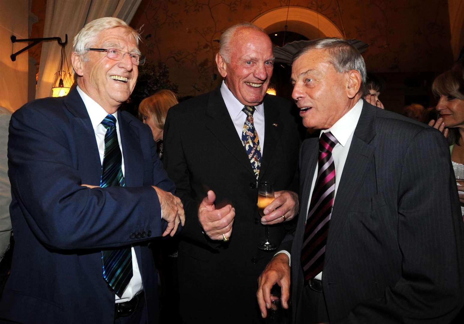 Sir Michael with Sir Henry Cooper and Dickie Bird at a party to celebrate the publication of his autobiography in 2008 (PA)