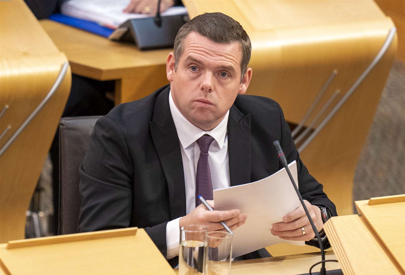 Scottish Conservative leader Douglas Ross raised the issue during FMQs (PA)