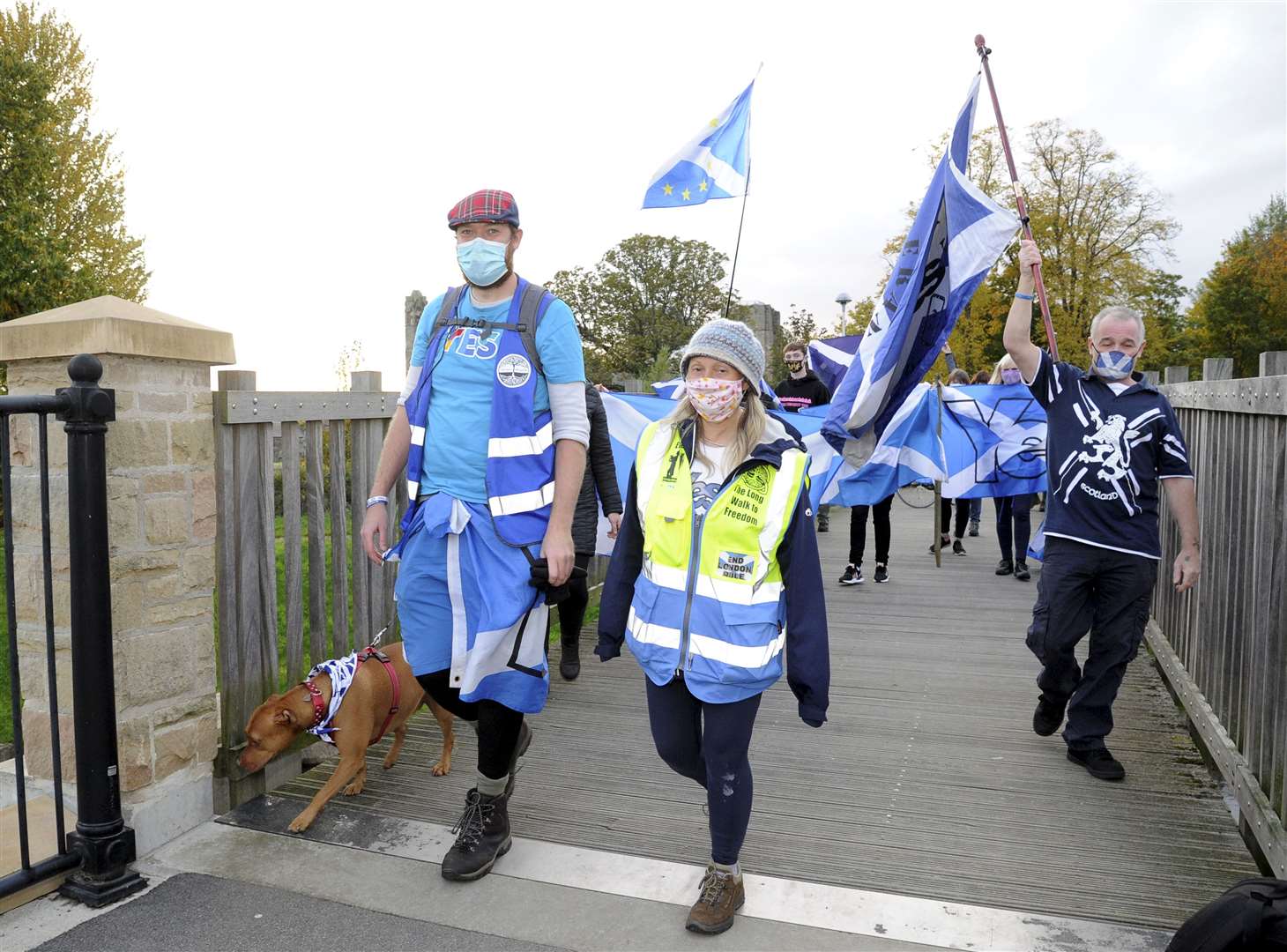 The Long Walk To Freedom march made its way into Elgin yesterday, ending here at the Newmill Brig. Walkers Ever Uan Beag and Iain Leckenby lead the march. Picture: Eric Cormack