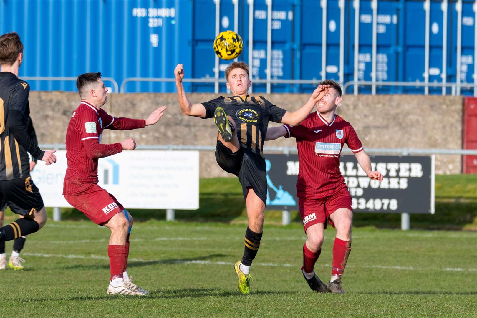 Huntly's Ryan Sewell takes control of the ball against Keith's Connor Killoh and Craig Gill.Keith F.C (1) v Huntly F.C (0) at Kynoch Park, Keith. Highland Football League.Picture: Beth Taylor