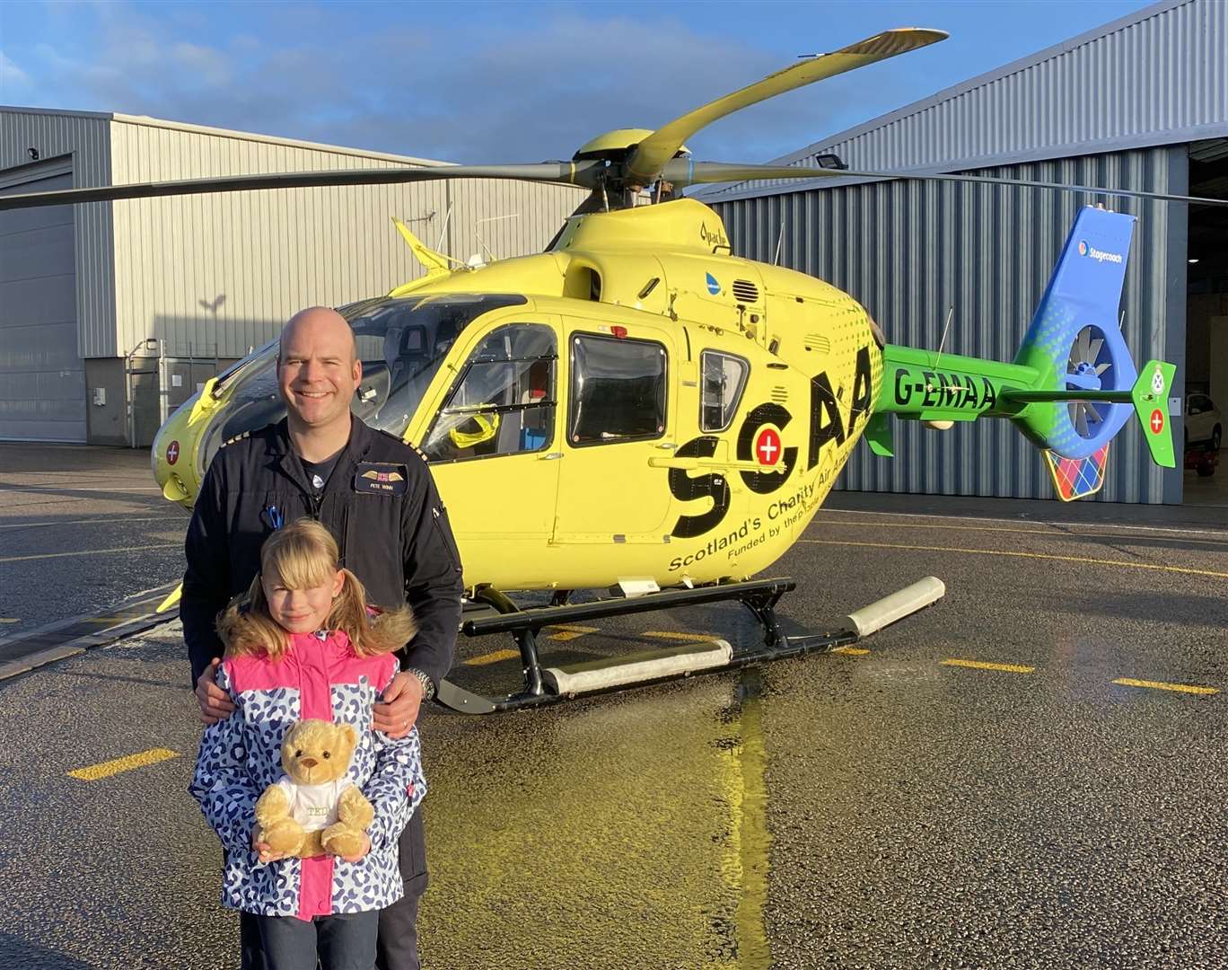 Arabella and teddy with Dad Captain Pete Winn at SCAA's Aberdeen base.