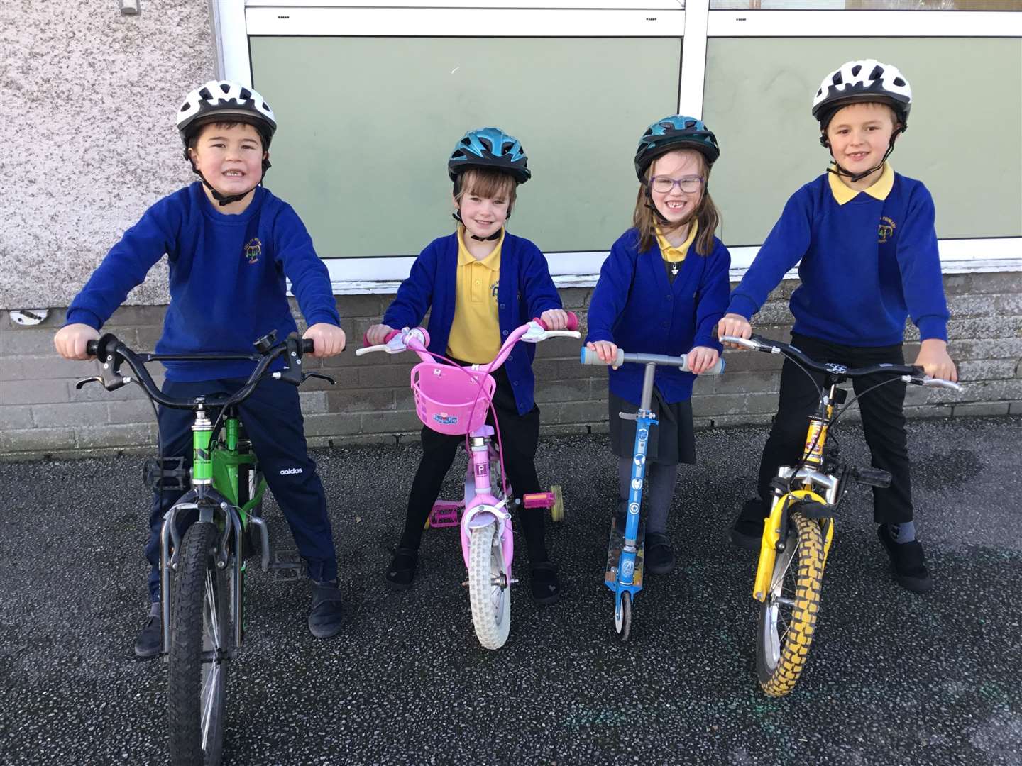 (From left) Cullen Primary Brodie McKandie, Darcy Farren, Freya Murray and Samson Irwin get ready to go for a spin on their bikes. Picture: Moray Council