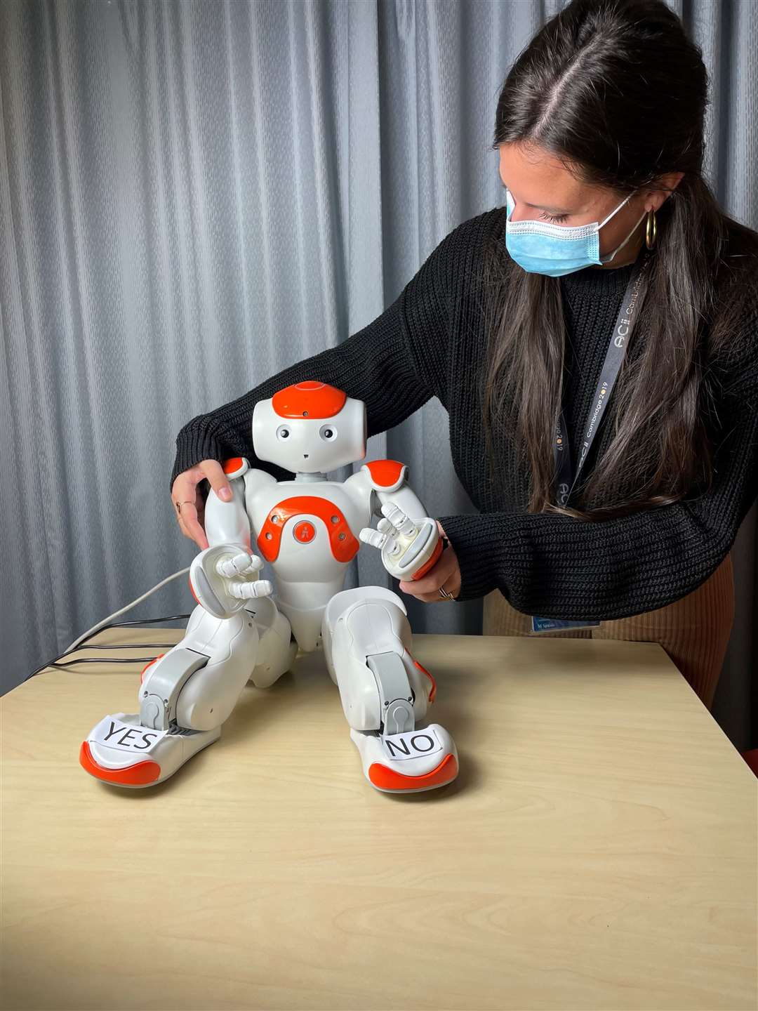 Children interacted with the robot by speaking with it, or by touching sensors on the robot’s hands and feet. (Cambridge University/PA)