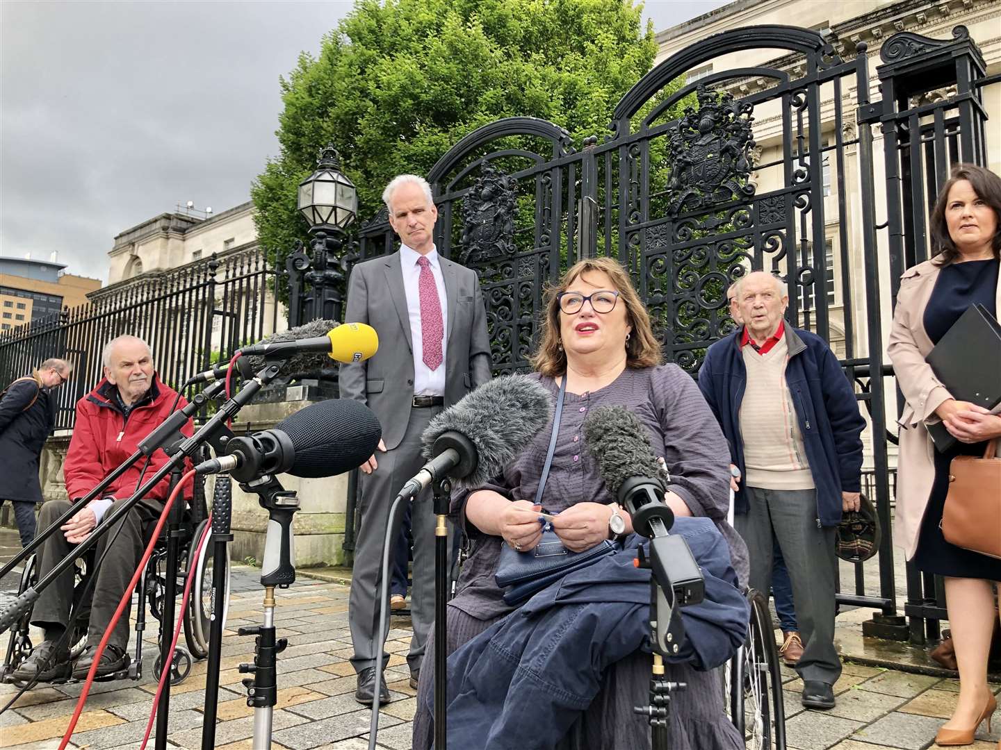 Jennifer McNern, joined by other victims and supporters from Wave Trauma group outside Belfast High Court (David Young/PA)