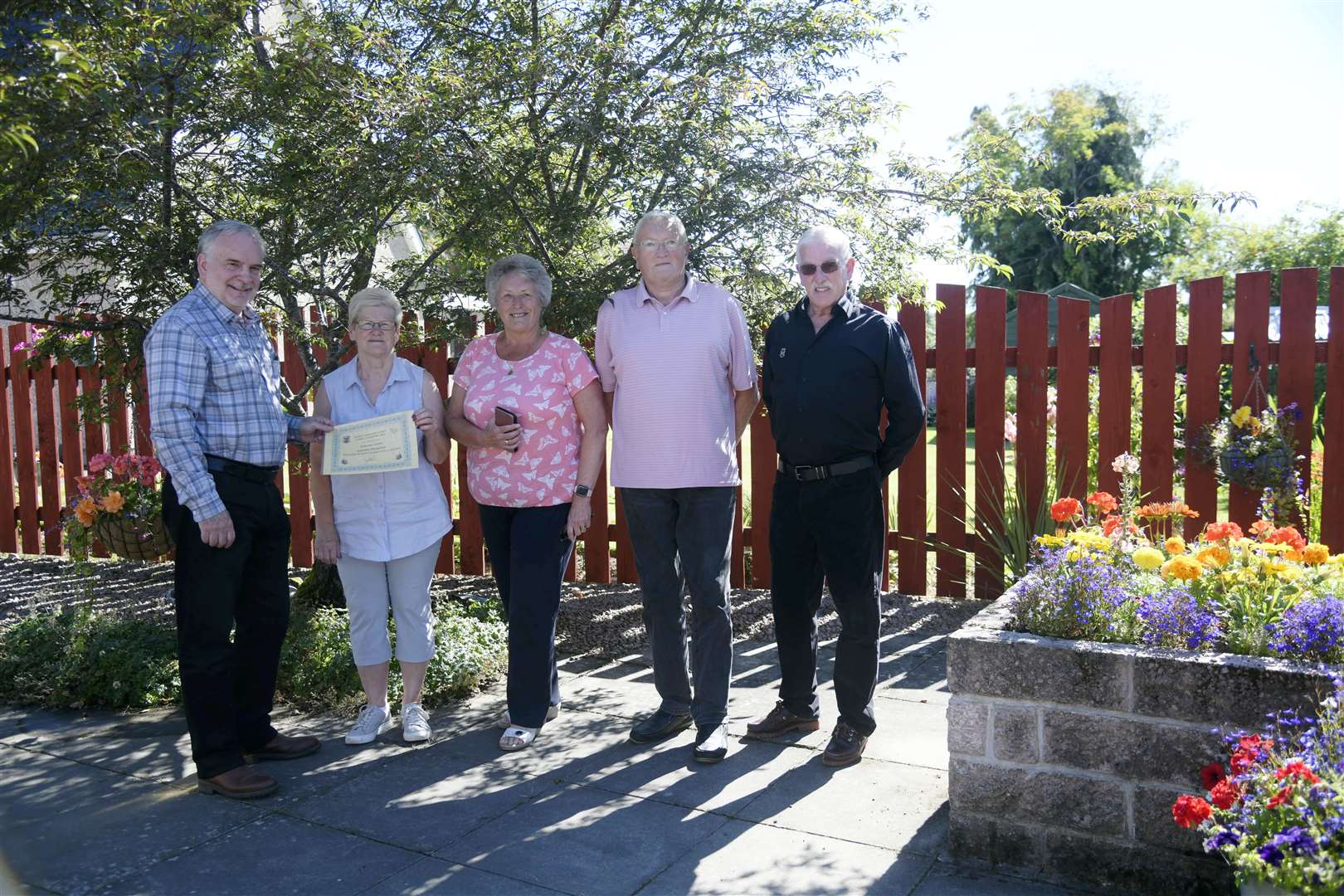 Huntly Community Council runs the annual Bonnie Gardens contest. (From left) Community Council chairman Tony Gill, Shelagh Milne, Margaret Forsyth, Ronnie Forsyth and John Porter...Picture: Beth Taylor.