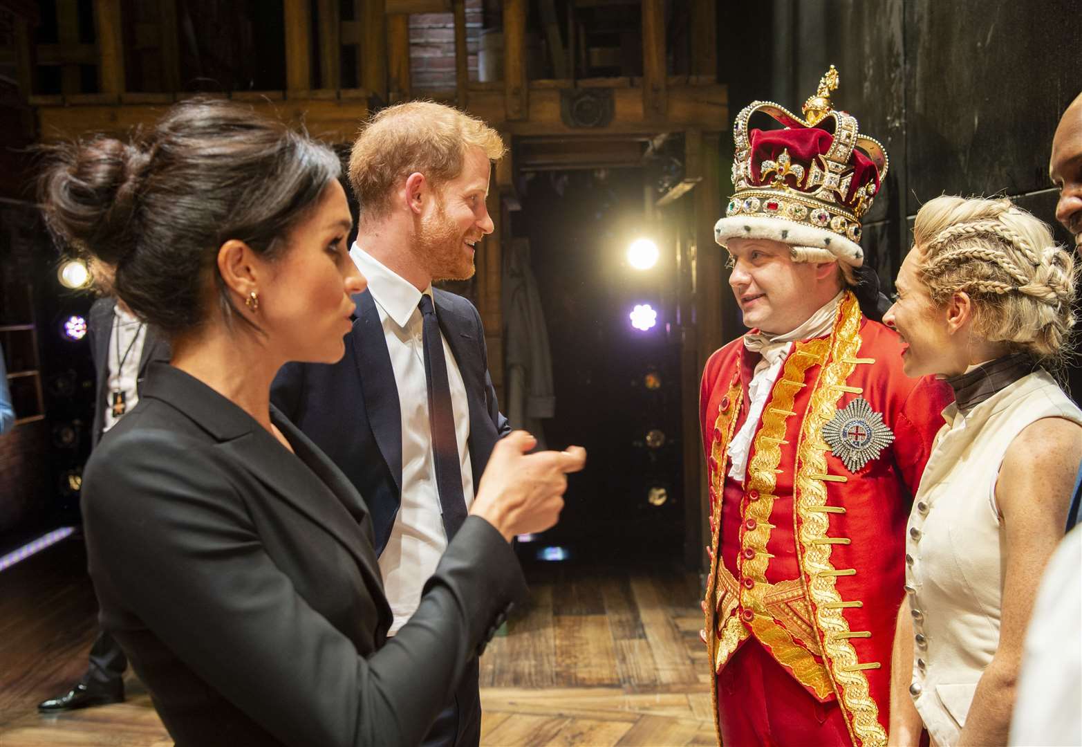 The Duke and Duchess of Sussex meeting ‘King George’ and the cast at the Victoria Palace Theatre in London (Dan Charity/The Sun/PA)