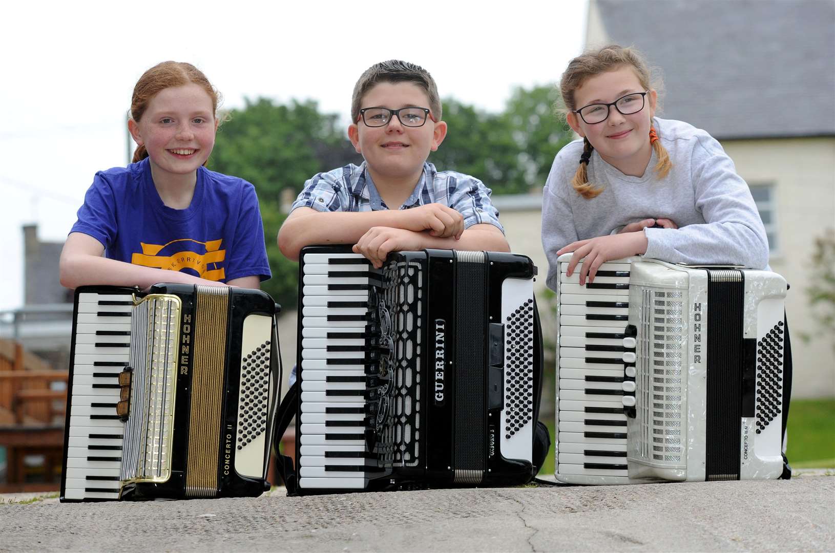 Accordion players, from left, Rachel Low, Fin Hope and Abbie Christie.