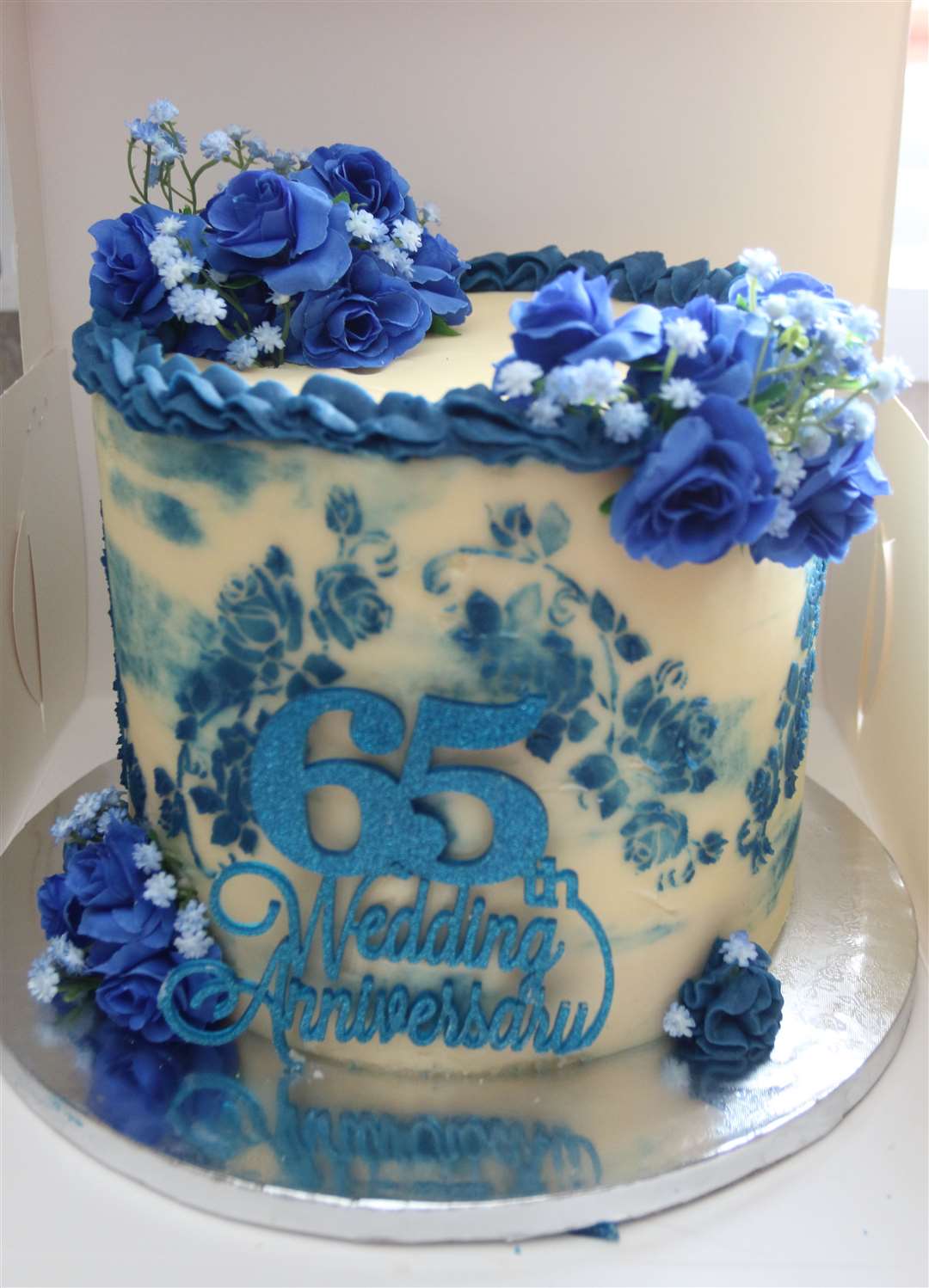 Thier anniversary cake was made by grand-daughter Jenna who runs Christie's Cake Creations in Huntly. Picture: David Porter