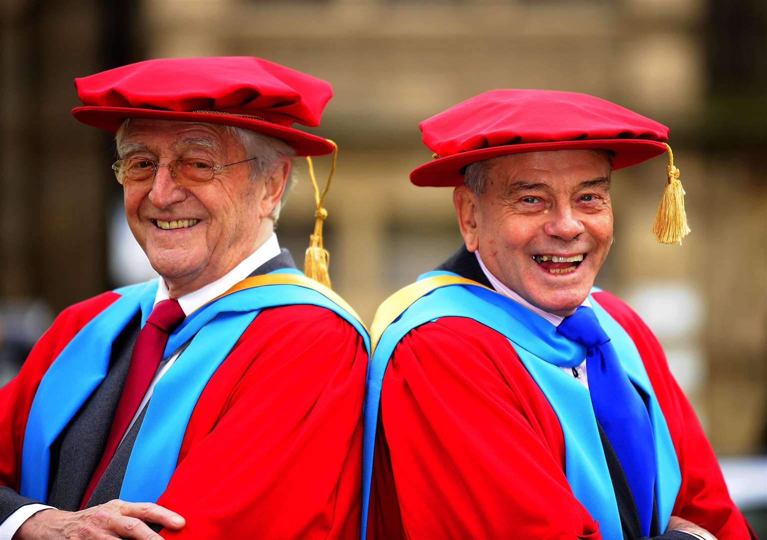 Sir Michael Parkinson (left) and Dickie Bird at the Huddersfield University campus in Barnsley, where they received honorary doctorates (PA)