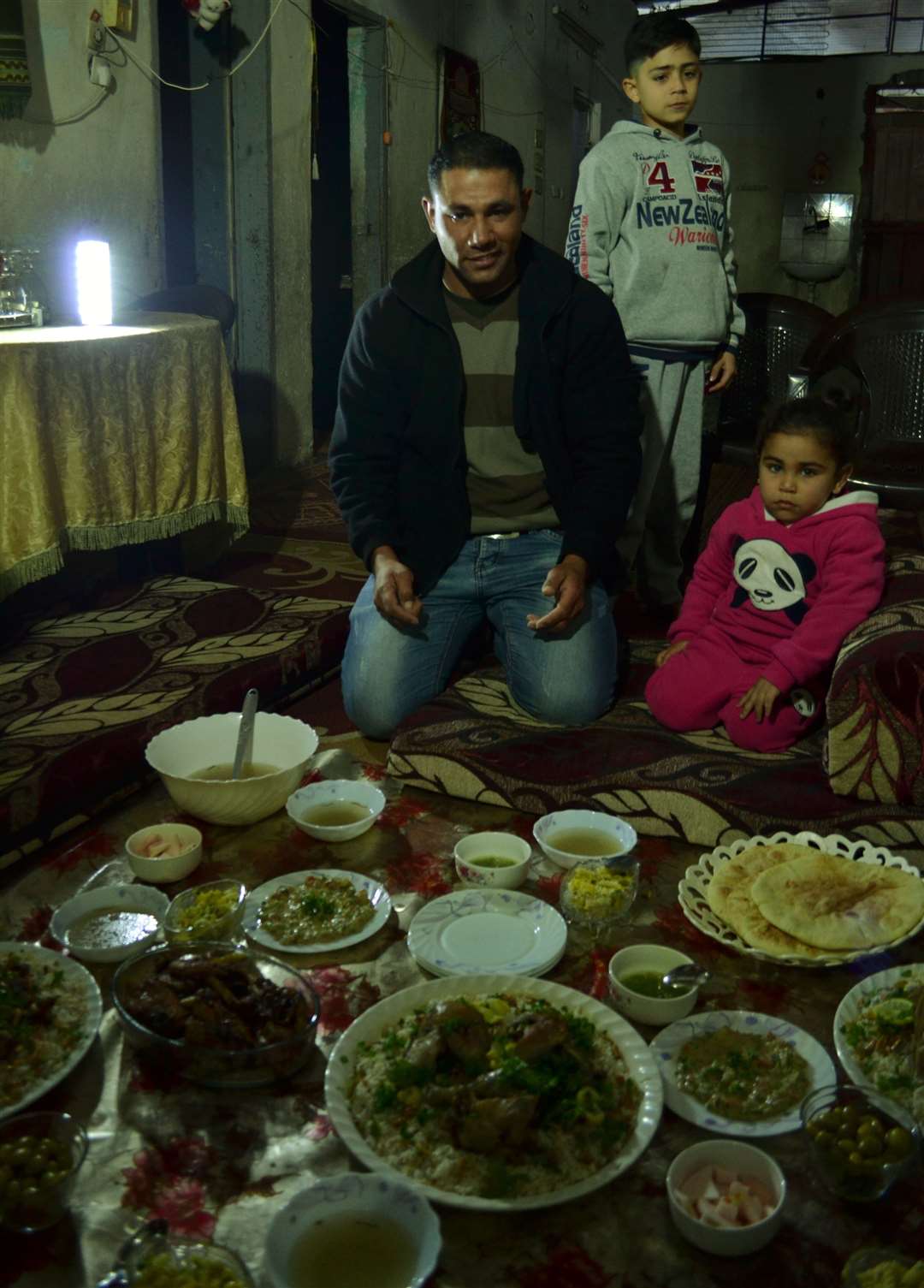 Sharing a meal with Shadi and his family