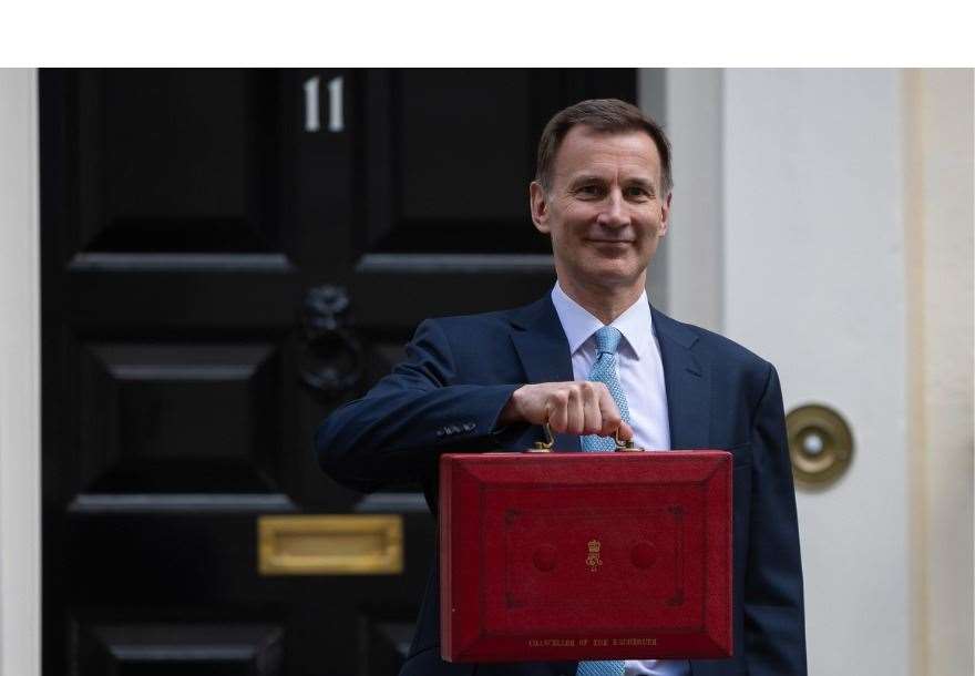 Chancellor Jeremy Hunt and the red box just prior to the spring budget.