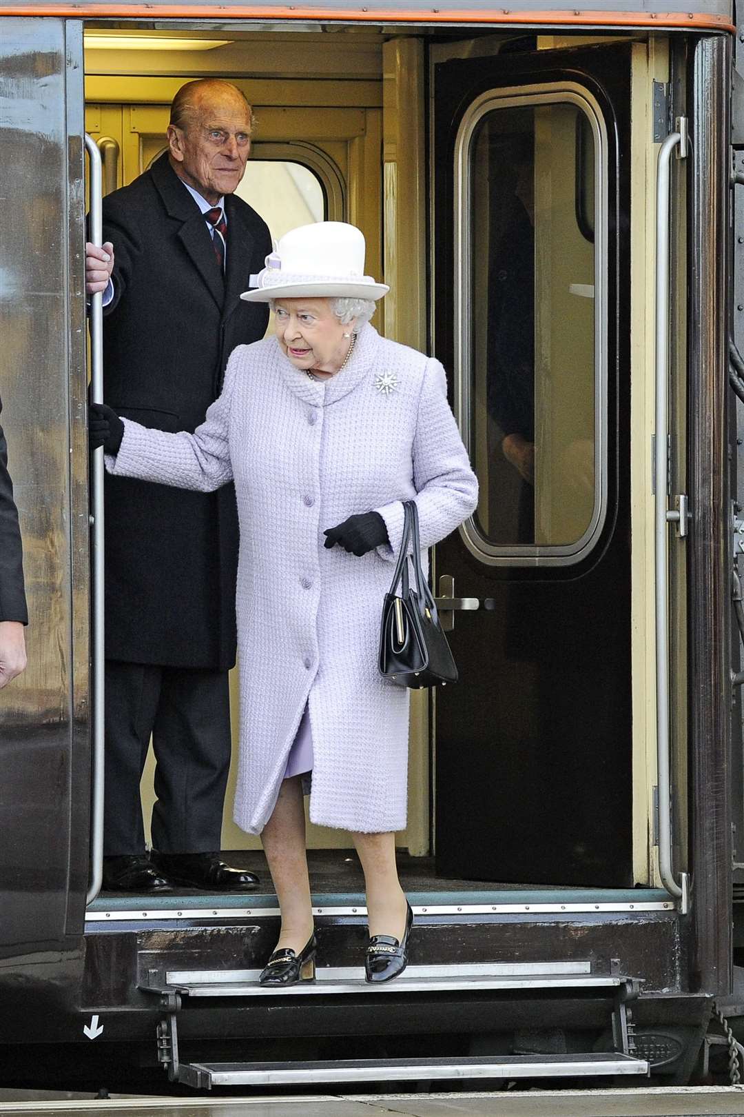 The Queen and The Duke of Edinburgh arrive at Elgin Railway Station on the Royal Train. Picture: Daniel Forsyth.