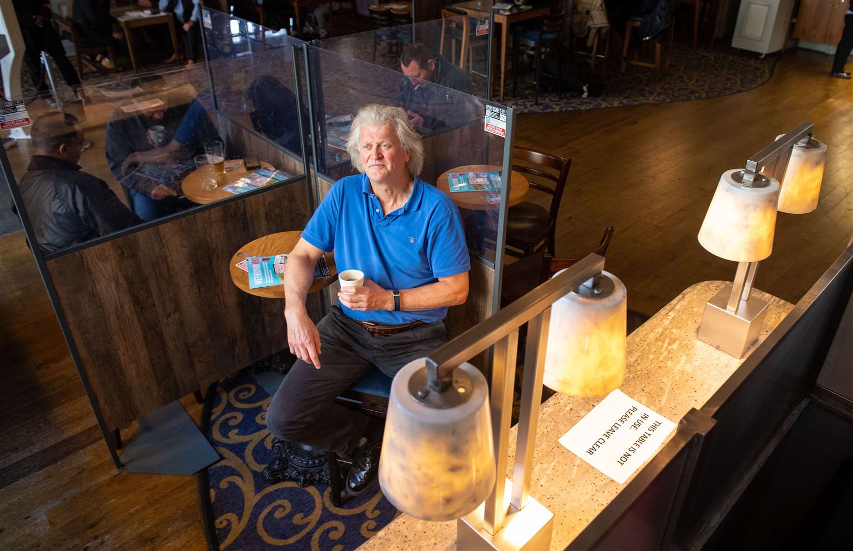 JD Wetherspoon chairman Tim Martin said the firm is increasing investment in its pubs (Dominic Lipinski/PA)