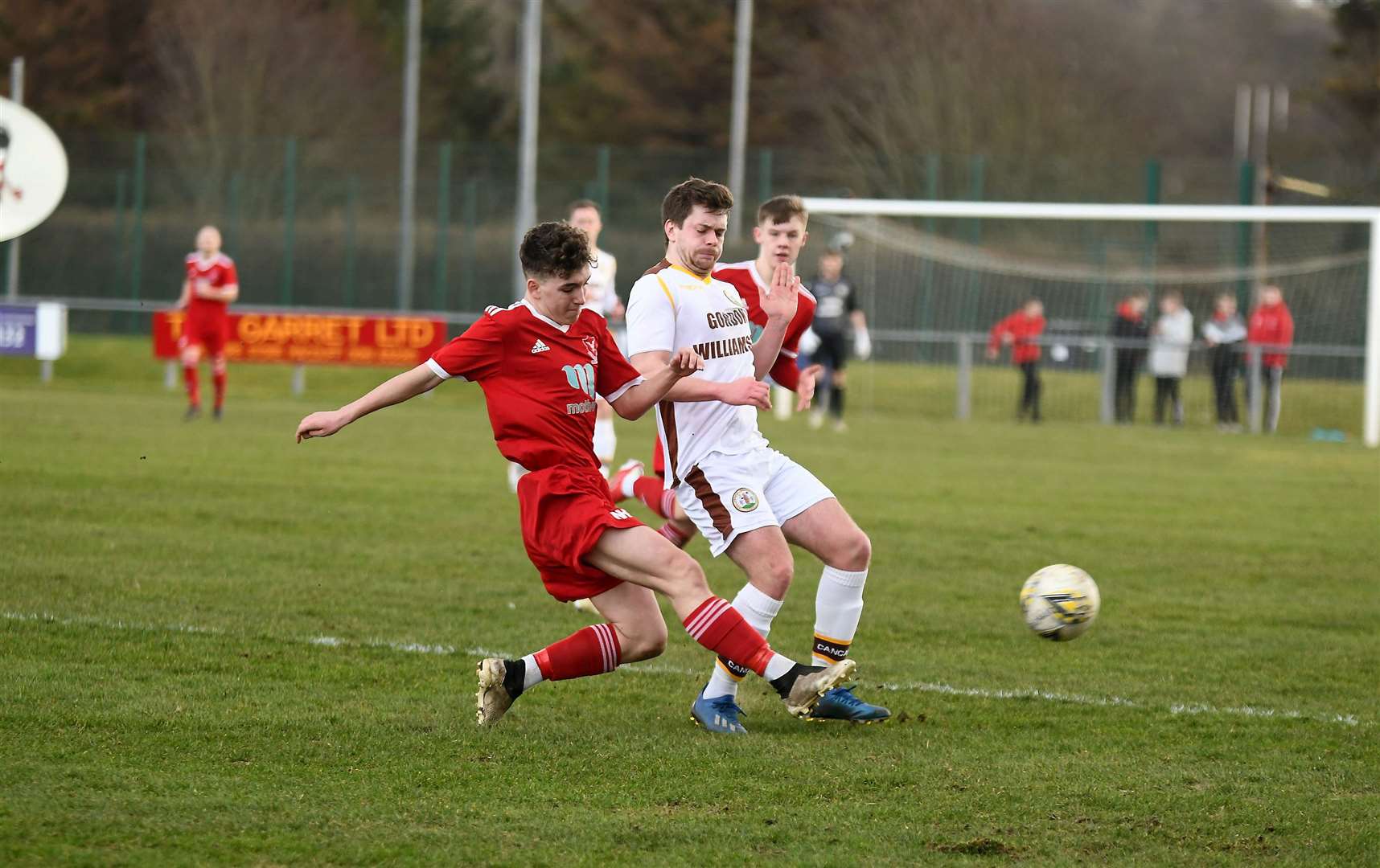 Jayden Goldie with Allan Macphee...Deveronvale v Forres Mechanics at Princess Royal Park...Picture: Becky Saunderson..