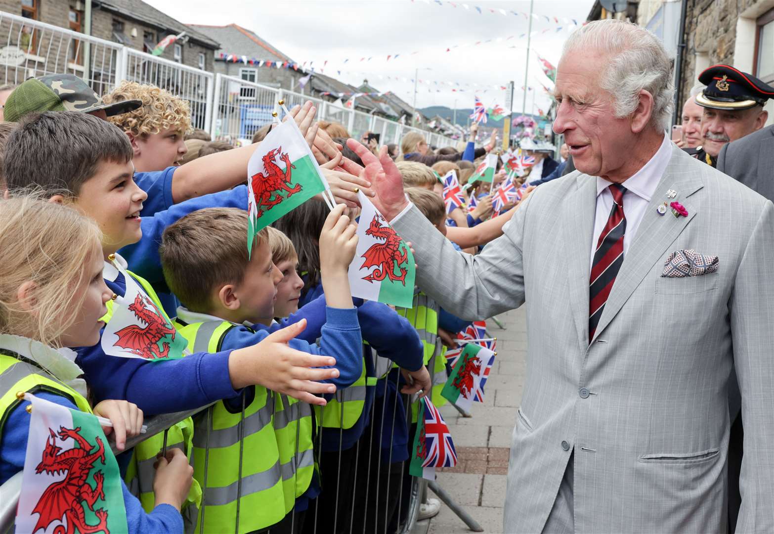 The Prince of Wales is greeted during a visit to Treorchy High Street (Chris Jackson/PA)