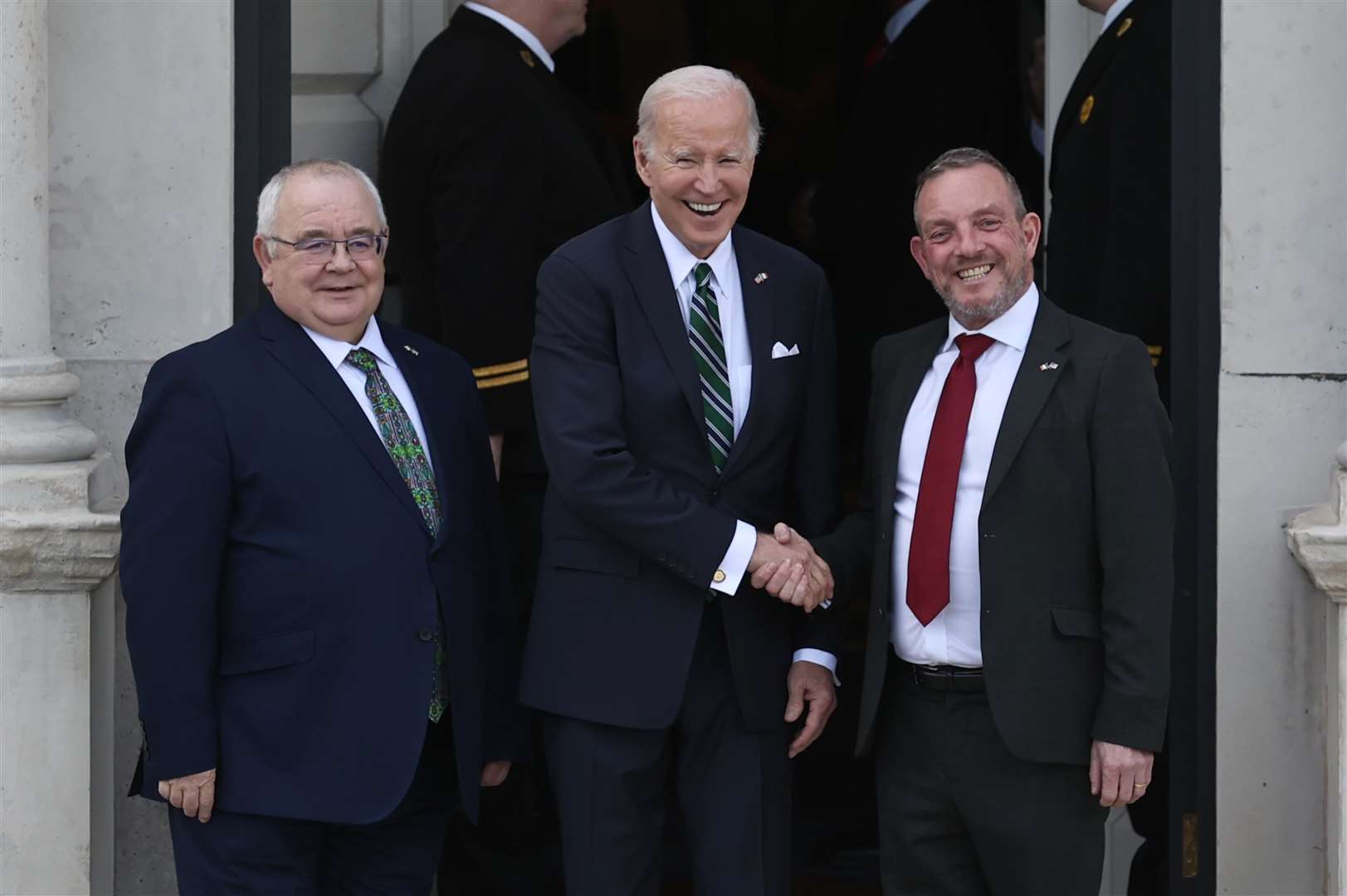 Joe Biden with Dail speaker Sean O Fearghail (left) and chairman of the Seanad Jerry Buttimer (right) on the steps of the the Oireachtas Eireann (Liam McBurney/PA)