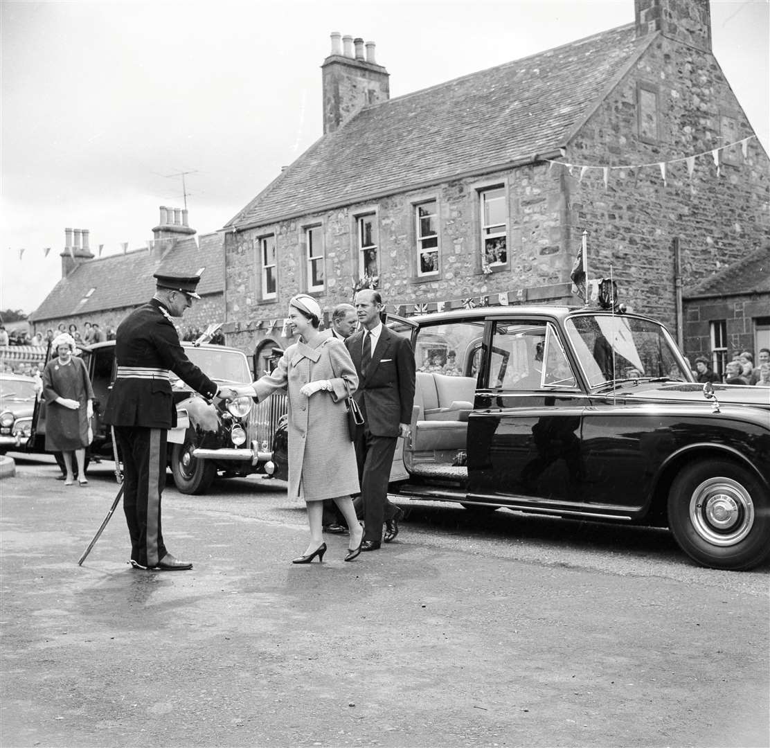 Her Majesty and Prince Philip are welcomed to Moray at Fochabers Square by Brigadier Sir Henry Houldsworth, the Lord Lieutenant on August 14, 1961. Picture: The Northern Scot archives
