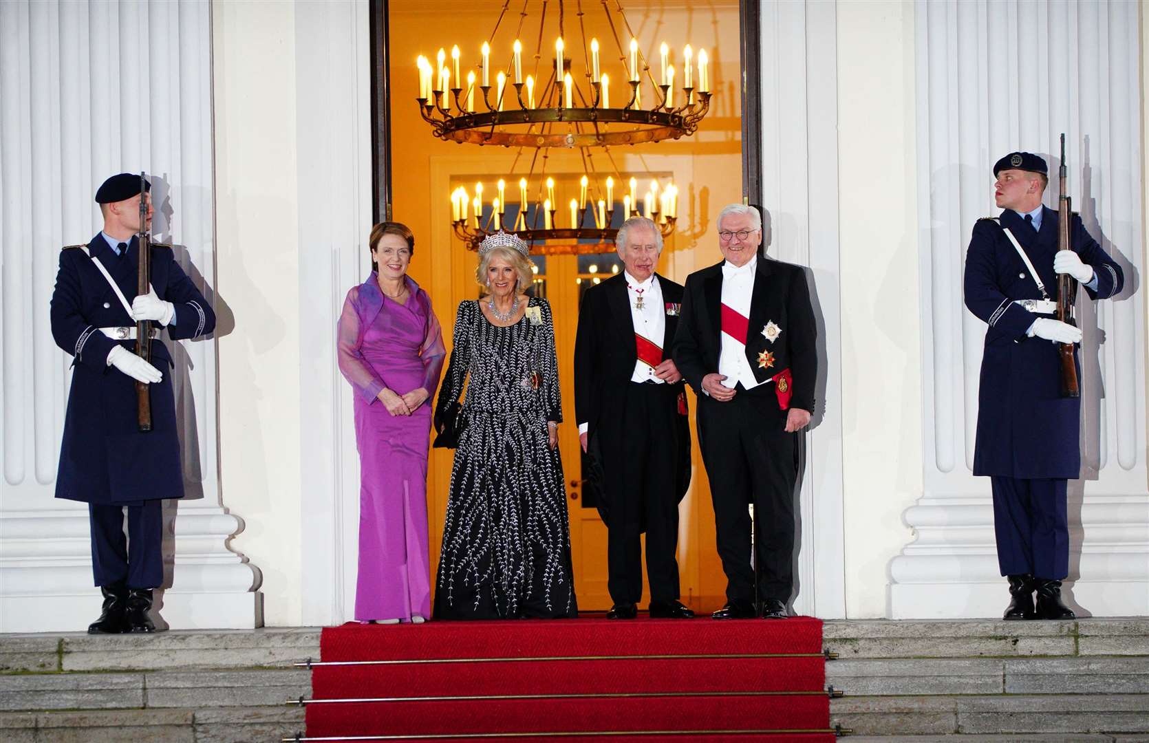(left to right) Elke Budenbender, the Queen Consort, Charles and German president Frank-Walter Steinmeier arrive at the state banquet at Bellevue Palace, Berlin (Ben Birchall/PA)